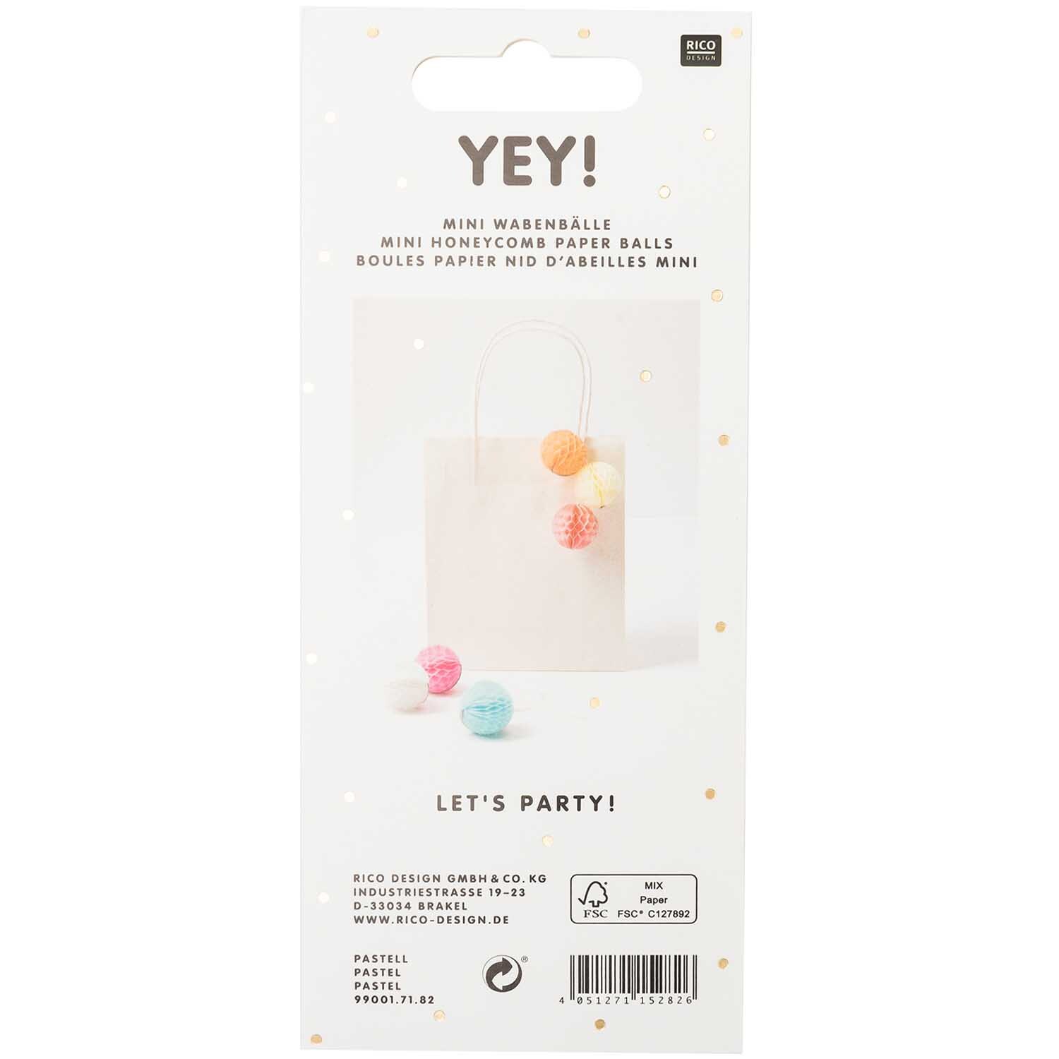 Mini-Wabenbälle 4cm 6 Stück in Pastellfarben, dekorativ an einer Geschenktüte befestigt. Perfekt für kreative Partydekorationen.