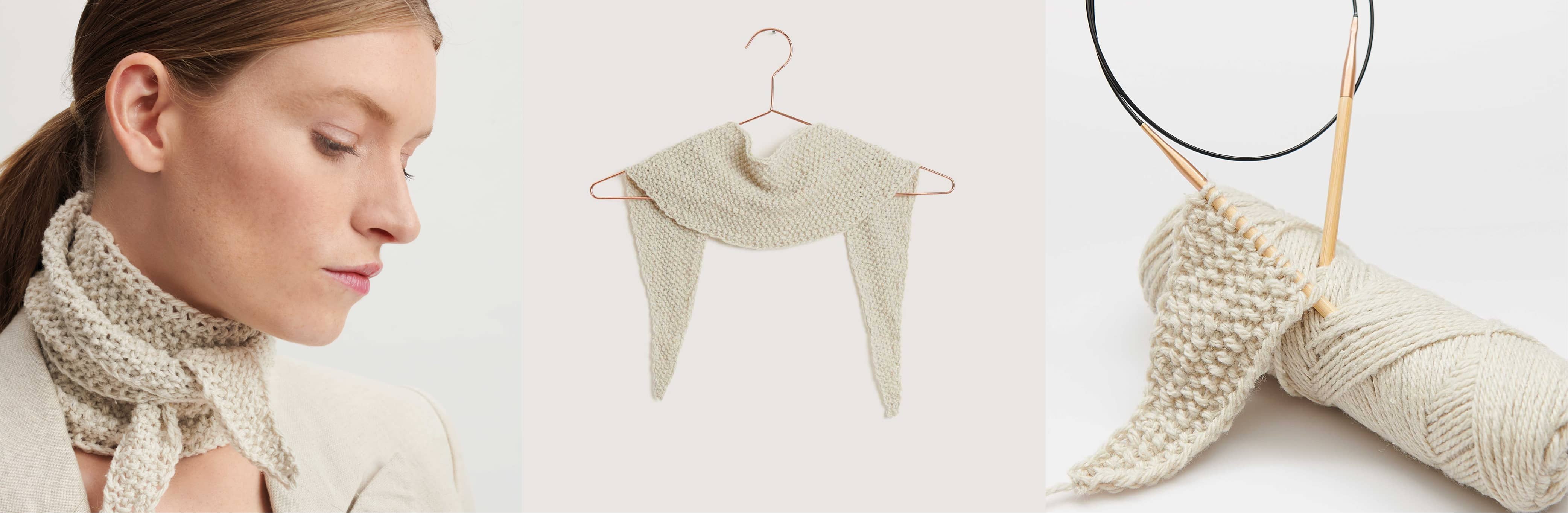Gestricktes Halstuch in Creme Modell 20 aus Made by Me No. 18 getragen am Model und auf einem Kleiderbügel. Daneben ein Wollknäuel in Creme und ein Strickstück mit Stricknadeln