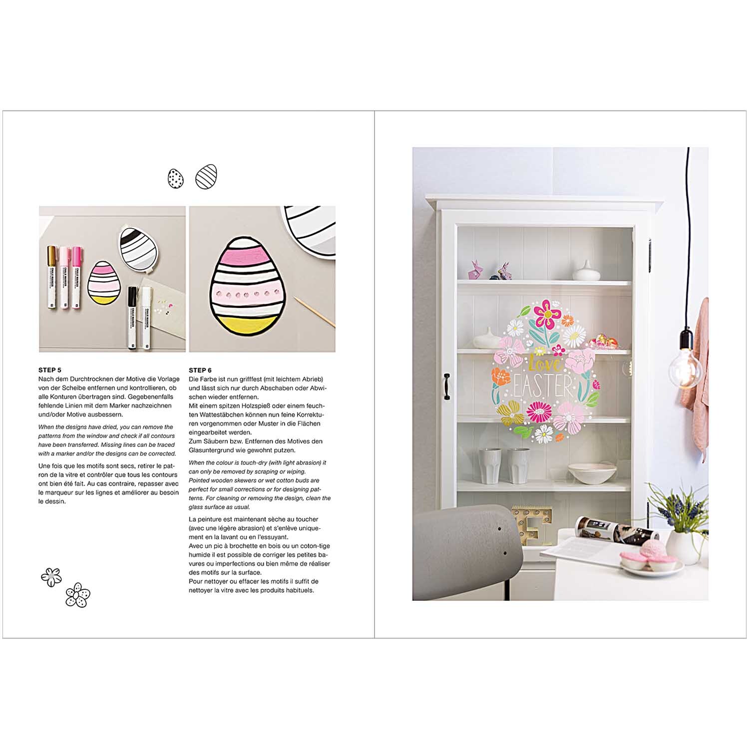 Vorlagenmappe Ostern Fenster- und Glasmalerei zeigt bunte Ostereier und Kreidestifte von Rico Design auf einem weißen Schrank.
