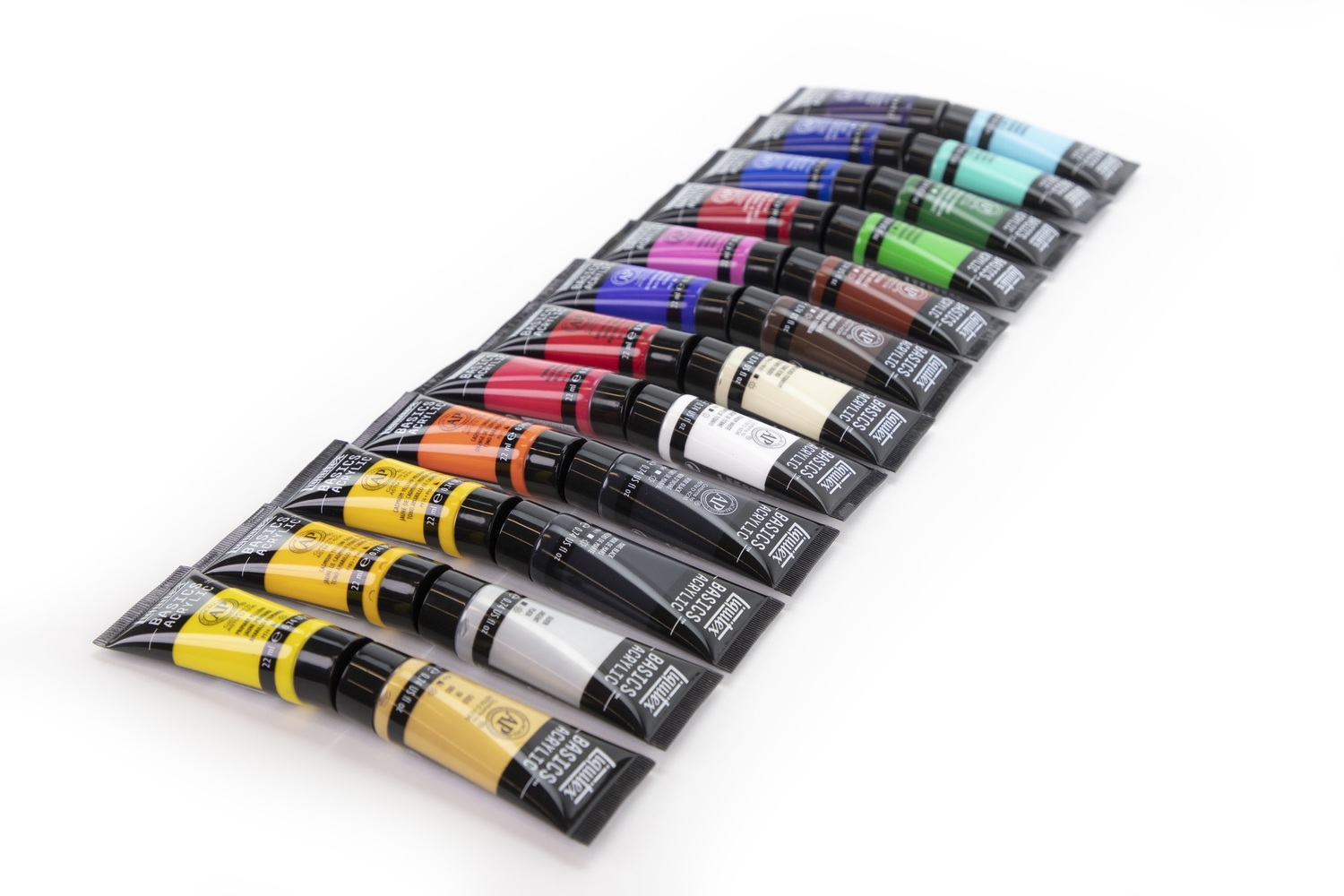 Basics Acrylfarben Set 24x22ml zeigt eine Reihe von bunten Farbtuben, ideal für kreative Projekte.