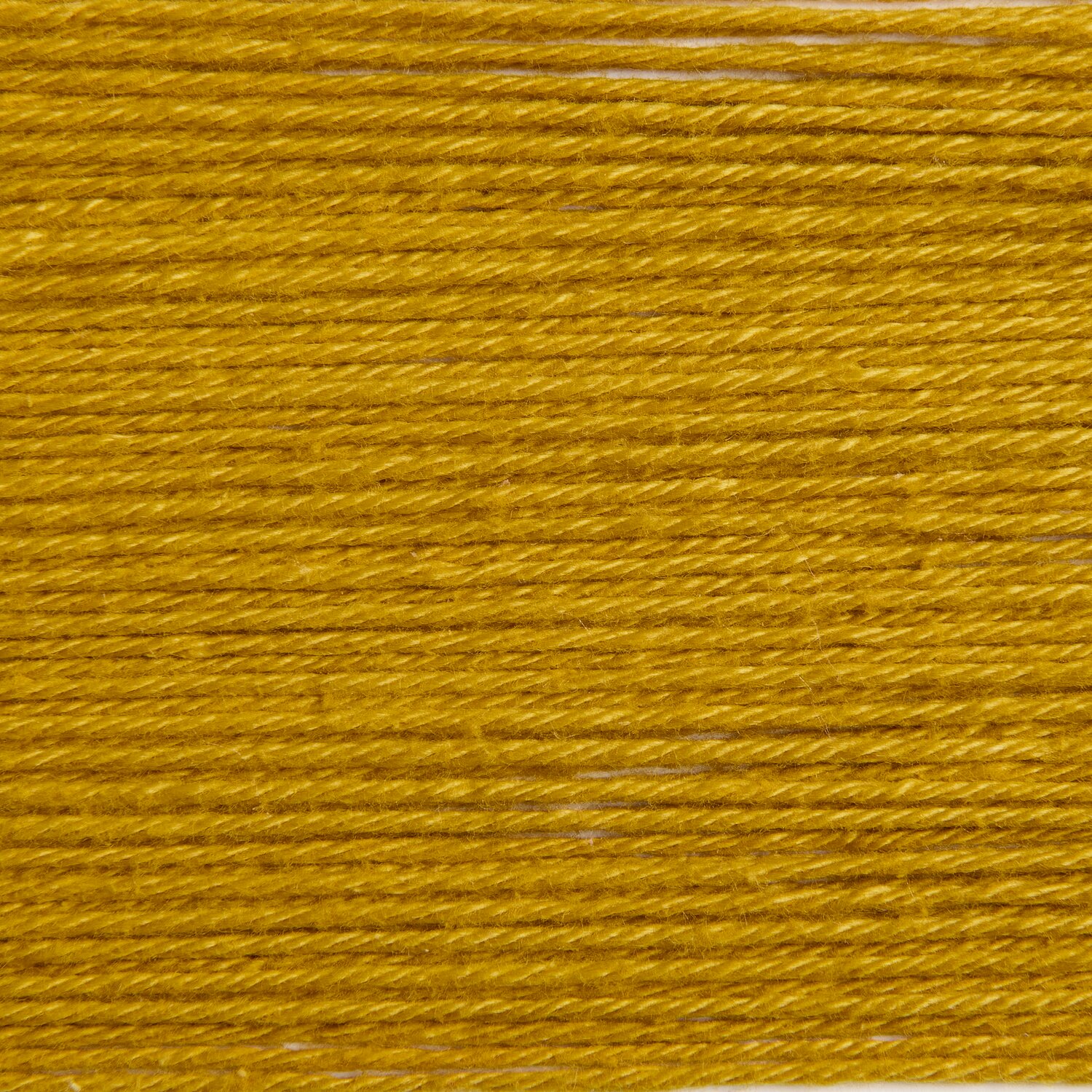 Rico Cotton in Honig, 50g 125m. Weiches Garn in warmem Gelbton, ideal für Strick- und Häkelprojekte.