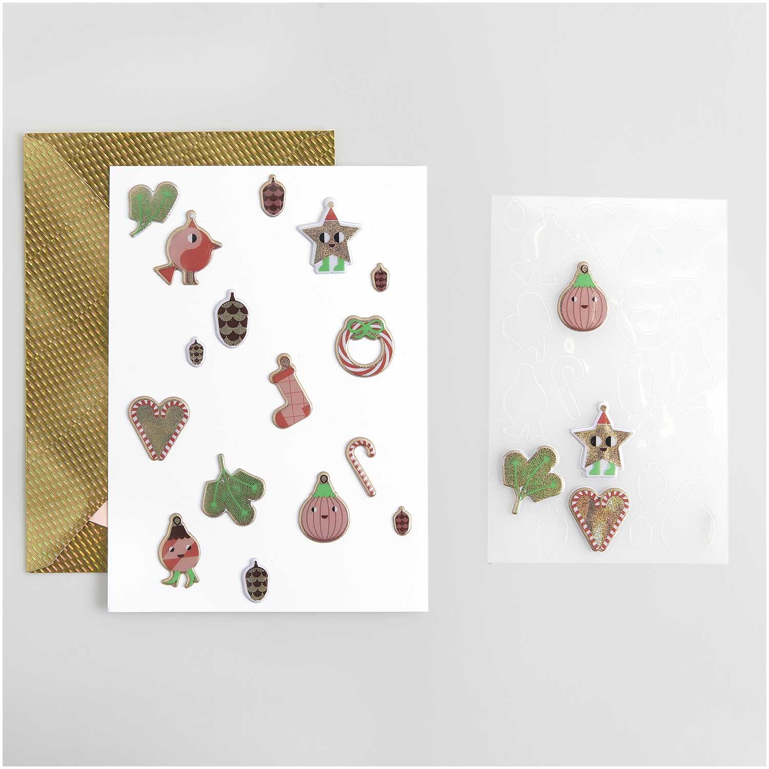 Paper Poetry Puffy-Sticker Airbrush 18 Stück von Rico Design auf Karten mit weihnachtlichen Motiven wie Herzen, Sterne und Tannenzapfen.