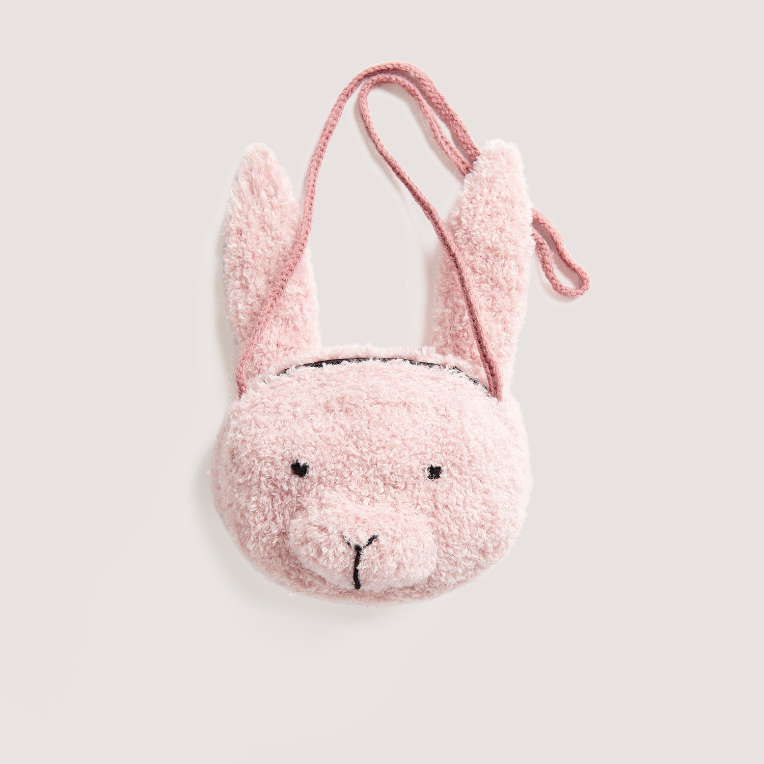 Strickset Häschentasche Modell 17 zeigt eine niedliche Tasche in Rosa, ideal für Kinder. Von Rico Design.