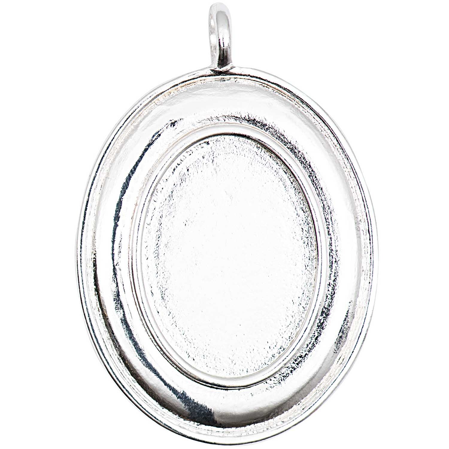 Cabochon Anhänger oval mit Rand 27x20mm von Rico Design in Silber, zeigt elegantes Design mit glattem Finish und feinem Rand.