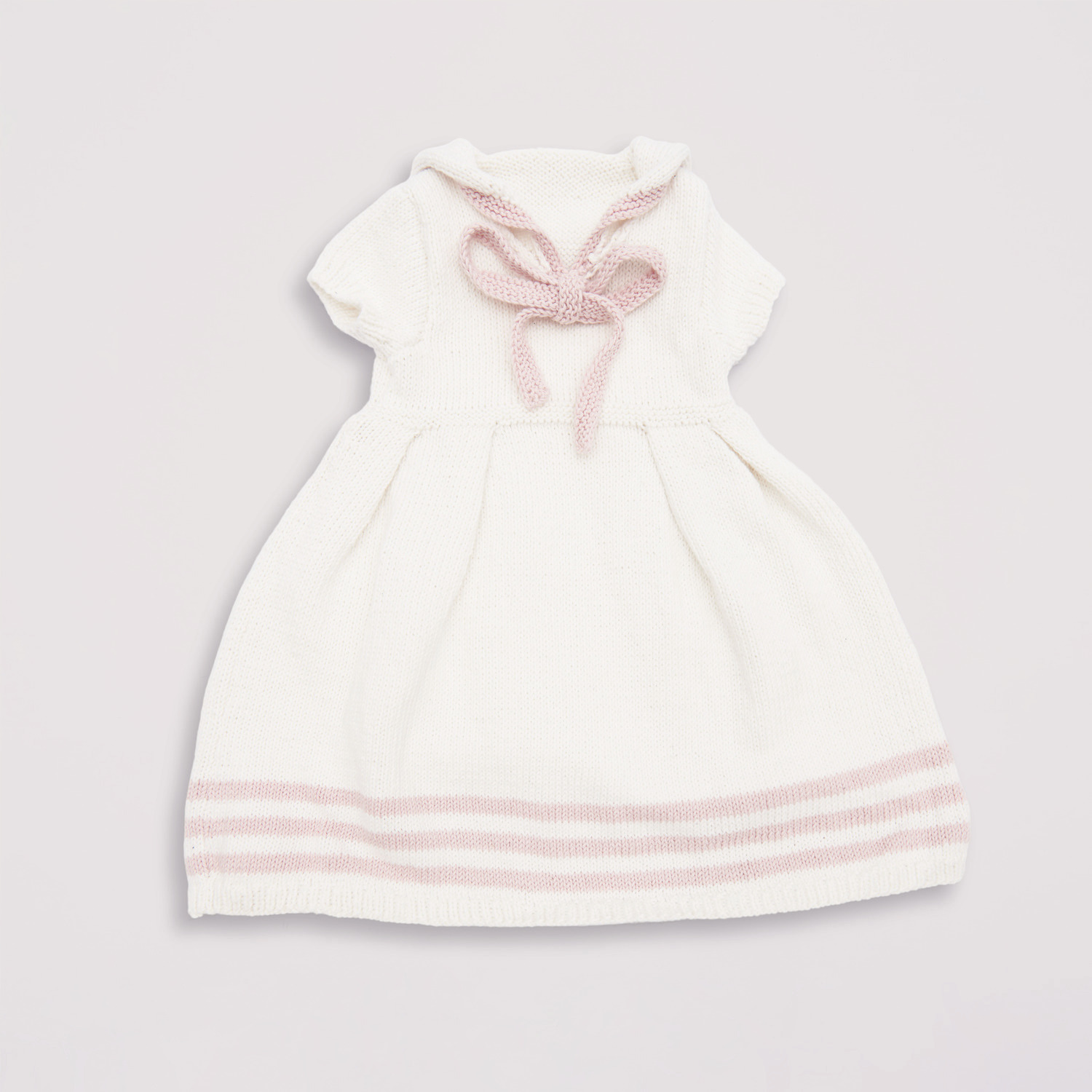 Baby Organic Cotton Kleid in Rosa und Weiß mit Schleife, ideal für zarte Babyhaut.