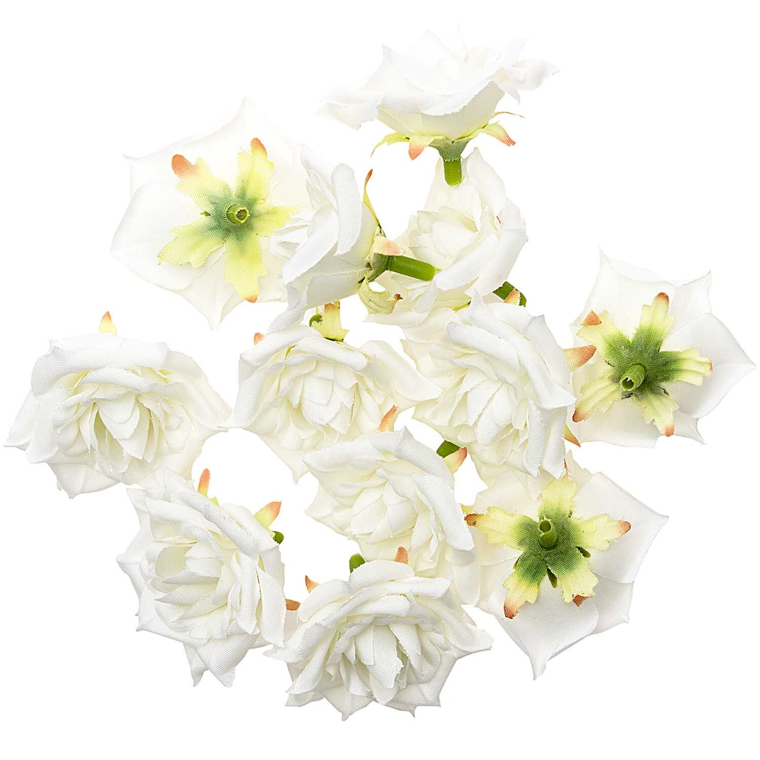 Rosenköpfe creme 5cm 12 Stück: Zehn weiße Rosenköpfe mit grünen Akzenten, ideal für kreative Dekorationen.