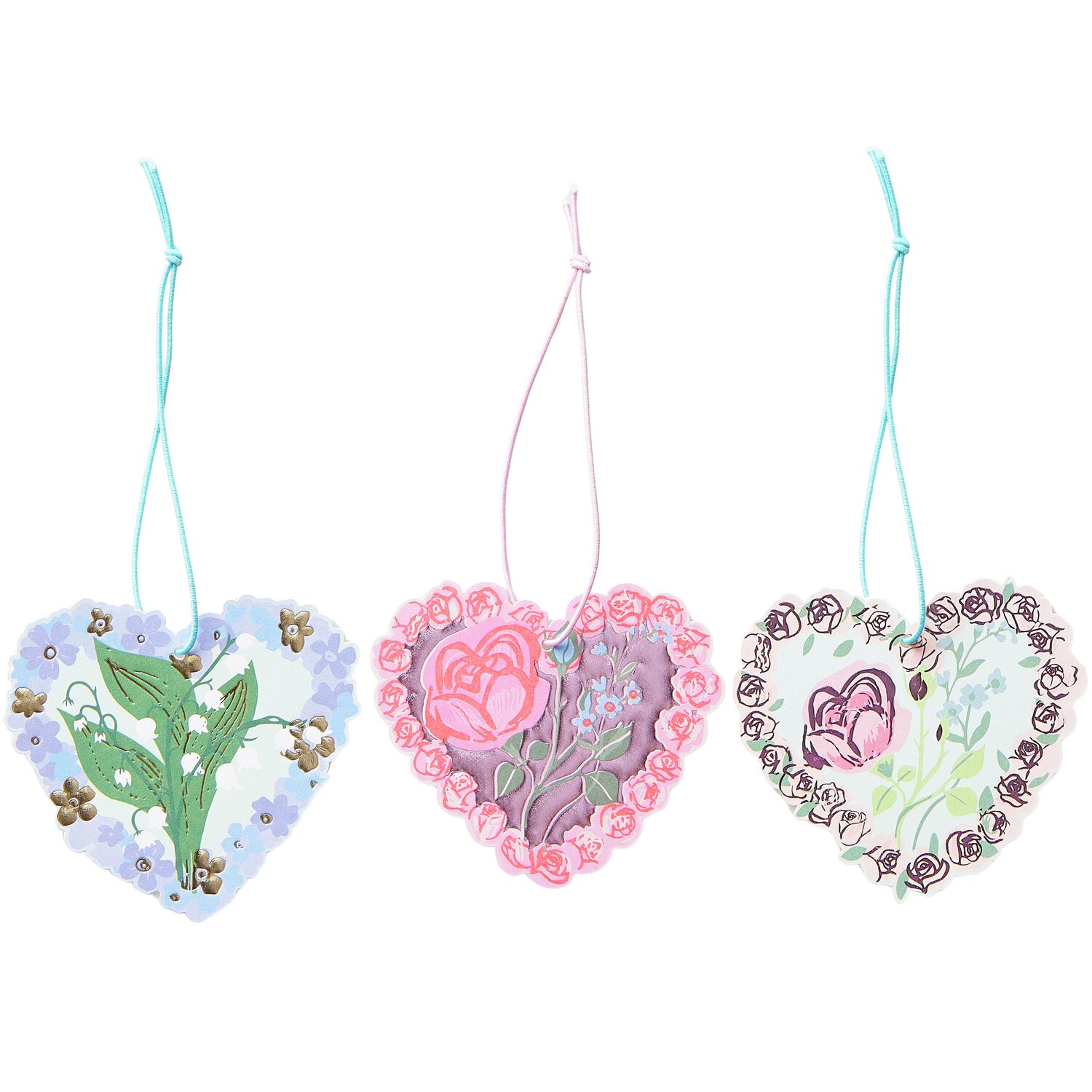 Paper Poetry Geschenkanhänger La Vie en Rose Herzen zeigen drei herzförmige Anhänger mit floralen Mustern und bunten Bändern. Ideal für kreative Geschenke.