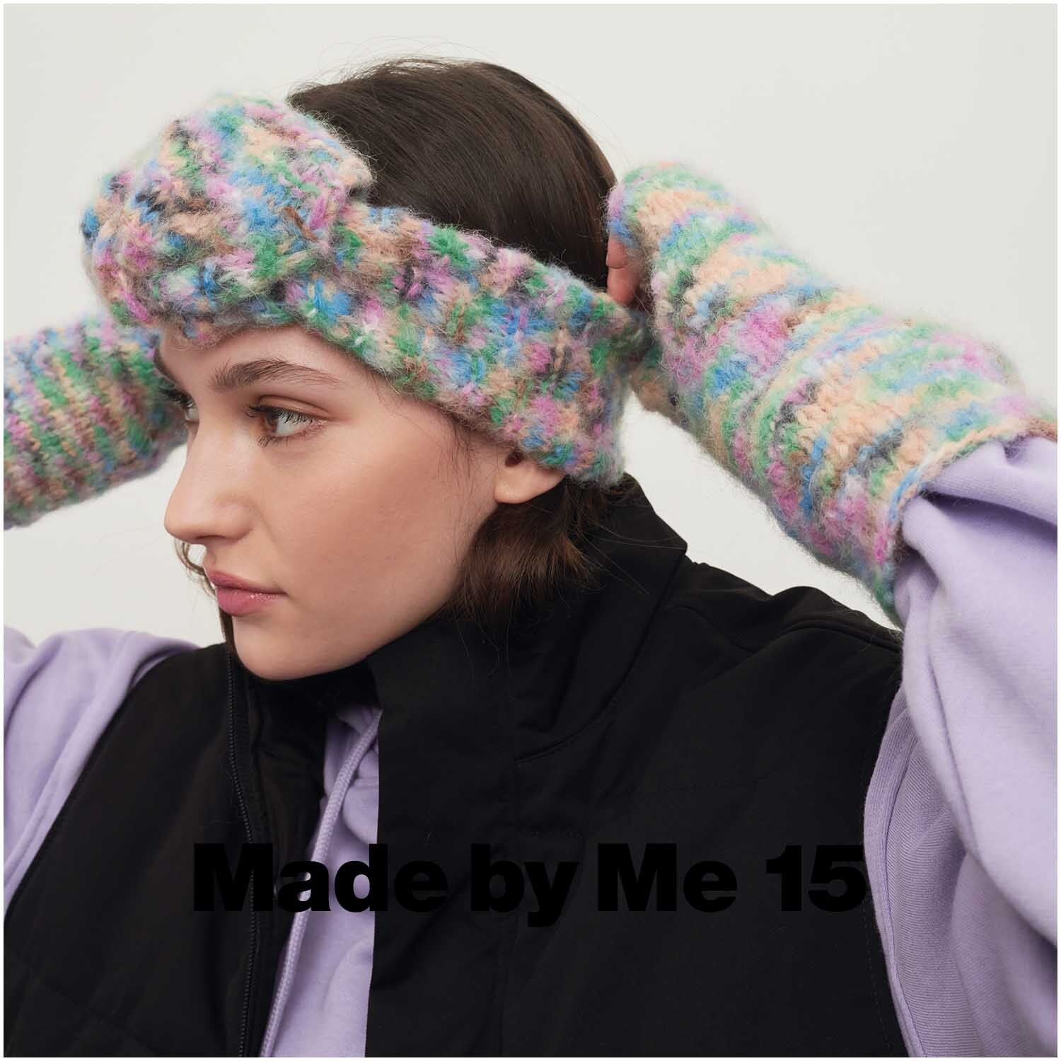 Fashion Light Luxury Hand-Dyed Stirnband und Handschuhe von Rico Design in Pastellfarben, getragen von einer Frau in lila und schwarz gekleidet.