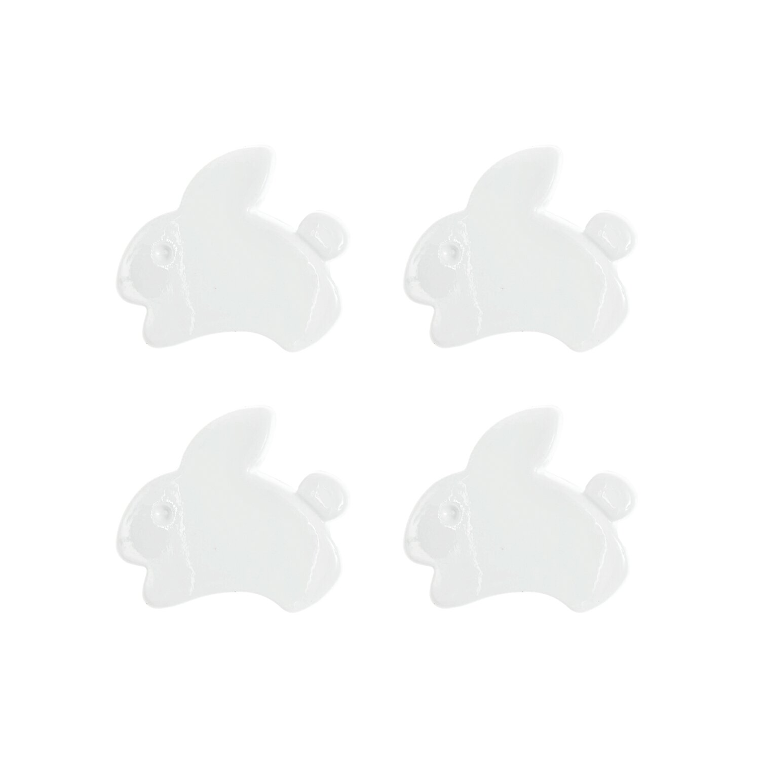 Vier weiße Knöpfe in Häschen-Form mit einer Größe von 1,5x1,3 cm.