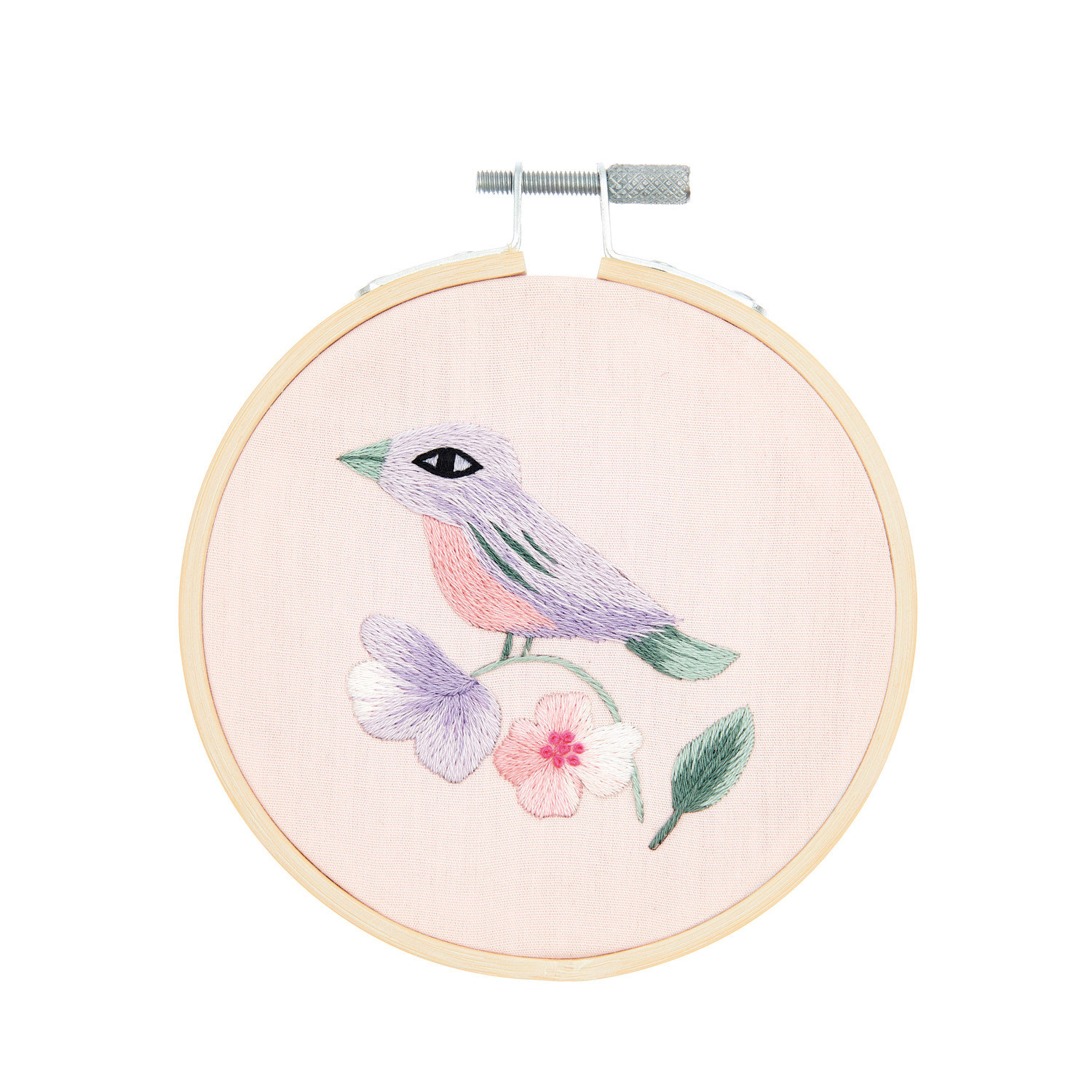 Stickpackung Vogel vorgezeichnet: Ein gestickter Vogel auf einem Ø10cm Stickrahmen von Rico Design, umgeben von Blumen.