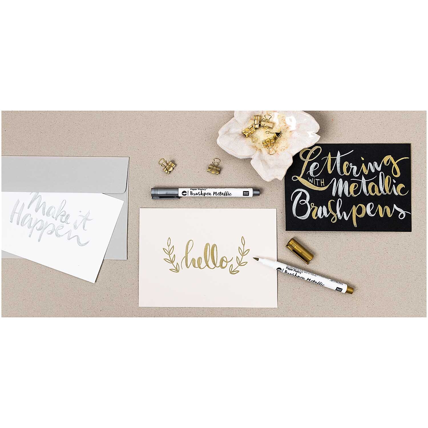 Paper Poetry Metallic Brushpens in Gold und Silber, ideal für kreative Grußkarten und elegante Schriftzüge. Perfekt für DIY-Projekte.
