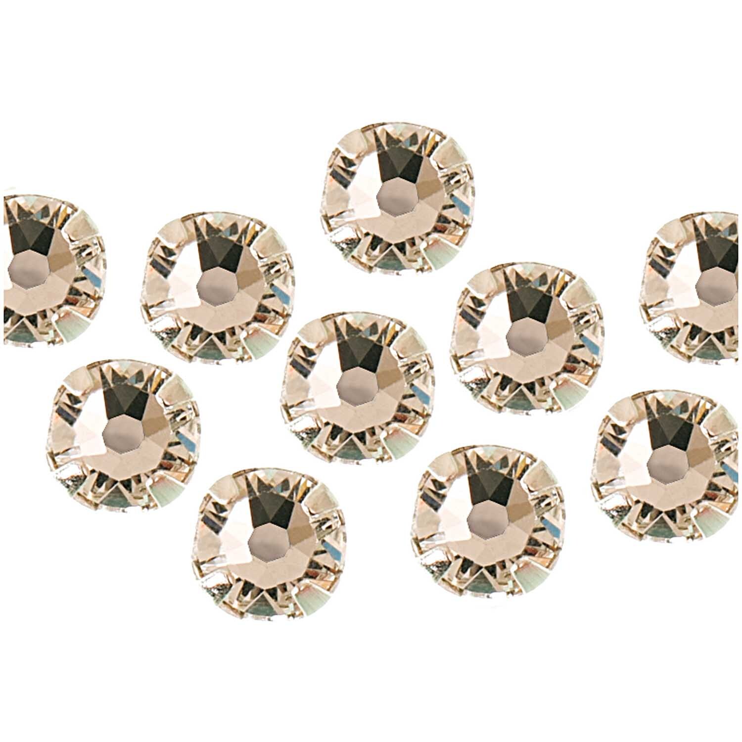 Aufnähsteine im Kessel, 4mm, 10 Stück von Rico Design. Zehn runde, funkelnde Steine in Kristalloptik.
