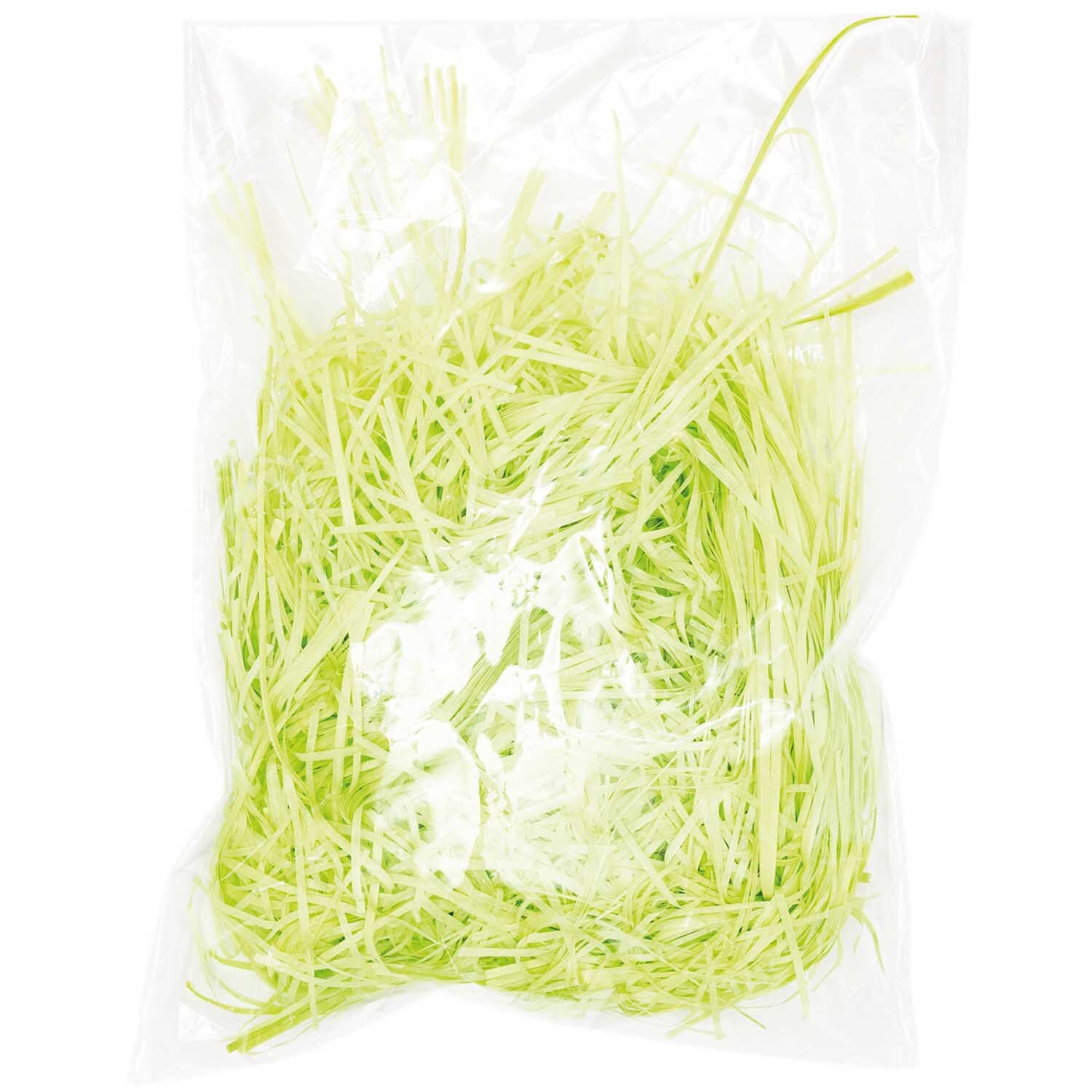 Ostergras 30g von Rico Design in einer transparenten Verpackung, ideal für Dekorationen.