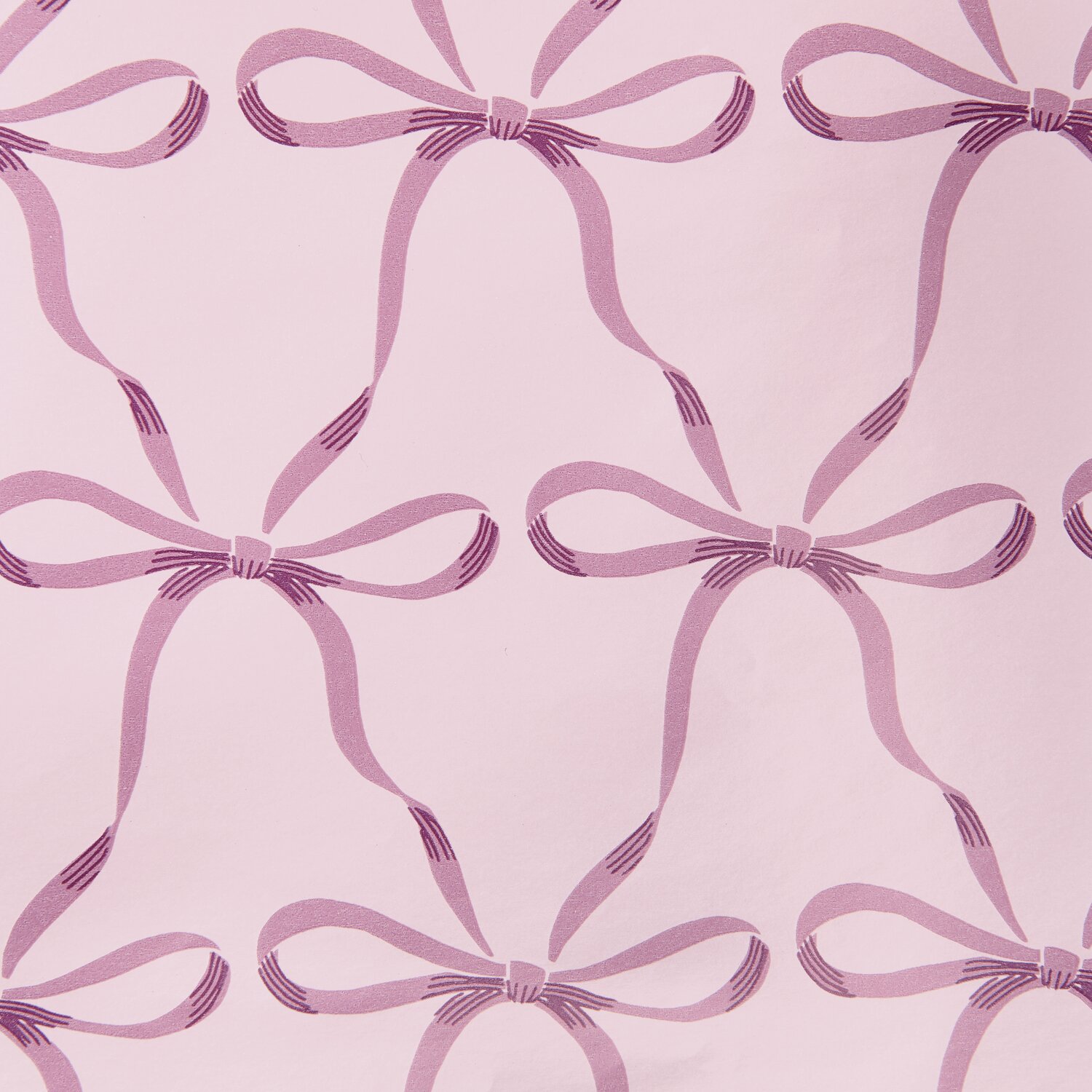 Geschenkpapier Schleifen Rosa, 200x70cm 80g/m², zeigt elegante Schleifenmuster auf zartem Hintergrund. Ideal für stilvolle Verpackungen.