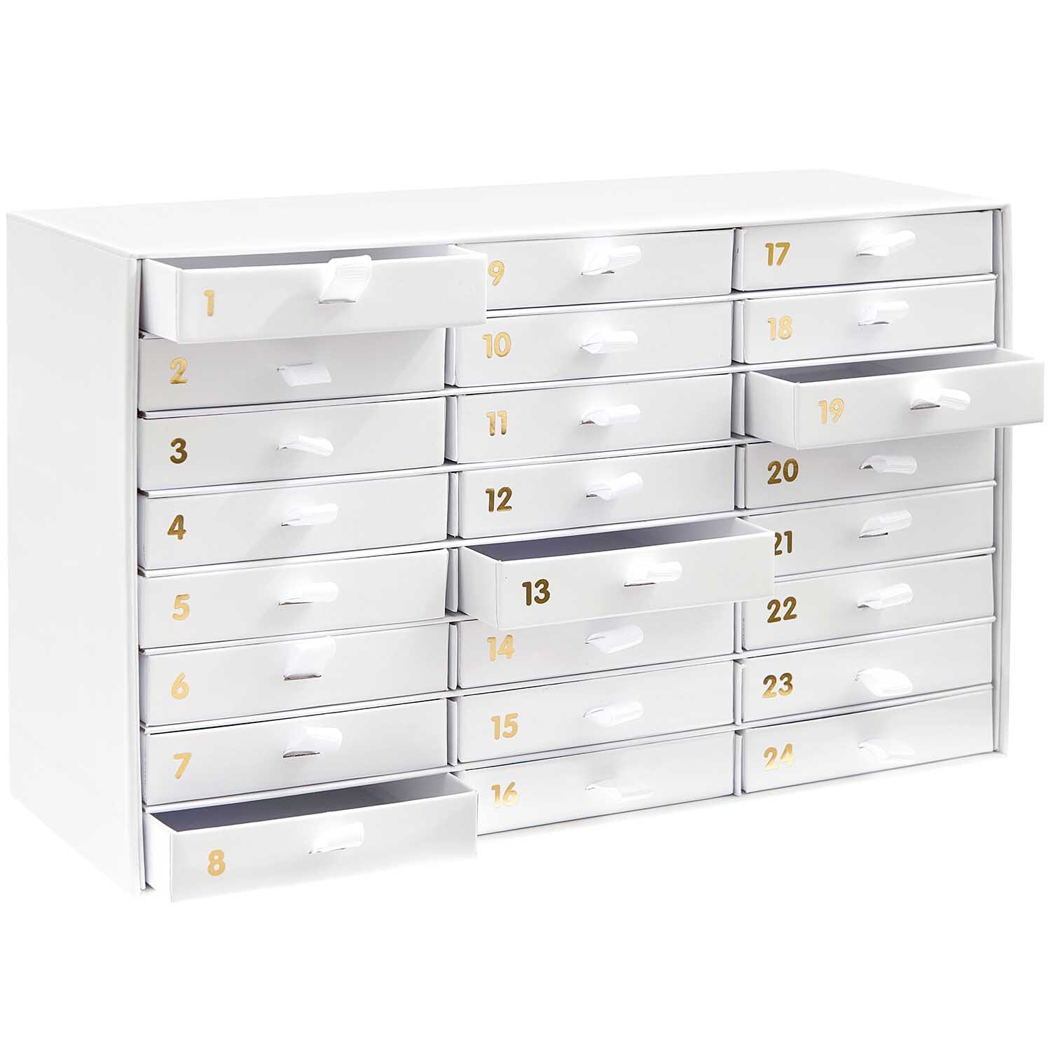 Adventskalender Box mit 24 weißen Schubladen und goldenen Zahlen, ideal für die Weihnachtszeit.