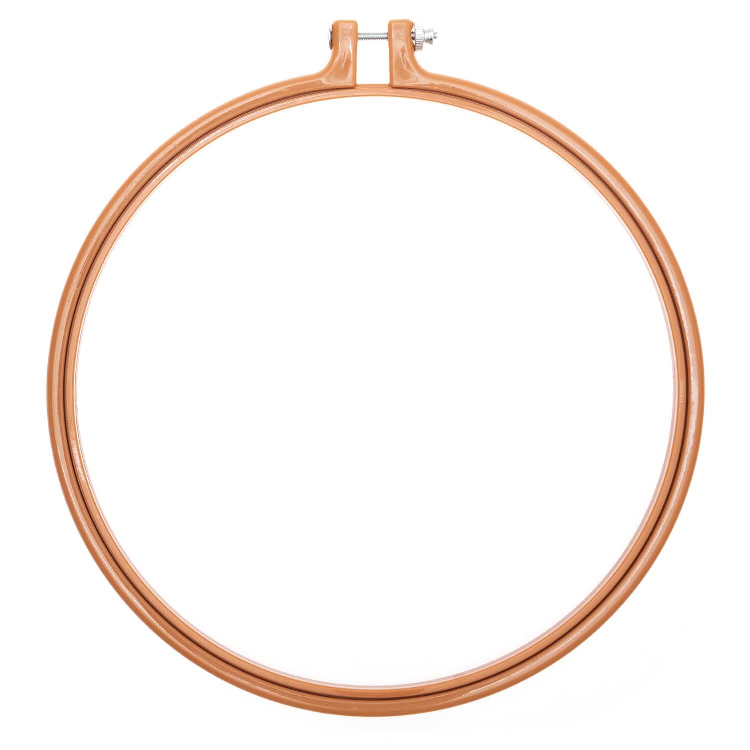 Stickring aus Kunststoff senf 22,8cm von Rico Design. Der runde Stickrahmen ist ideal für Handarbeiten.