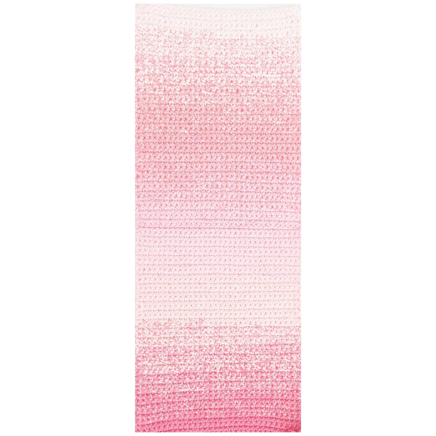 Ricorumi Spin Spin dk von Rico Design in Rosa, 50g. Das Bild zeigt ein gestricktes Muster in sanften Rosatönen.