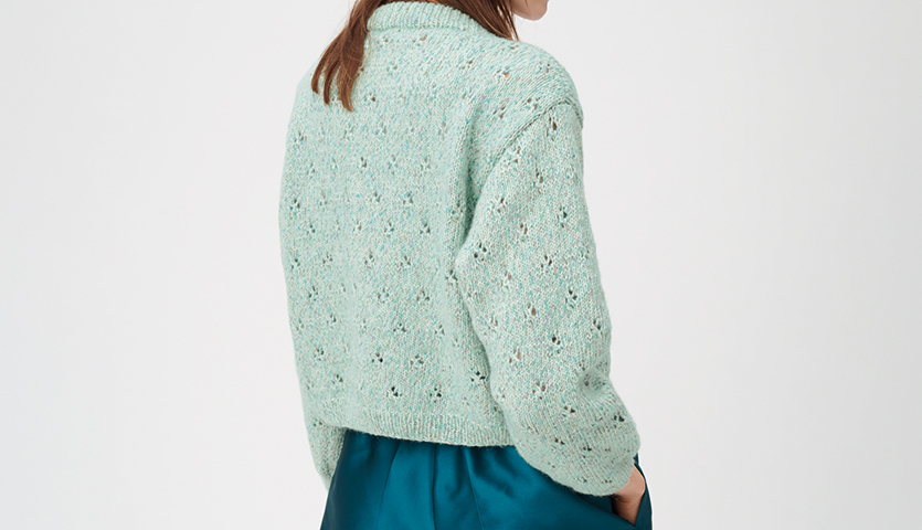 Strickanleitung für eine Jacke aus Creative Cotton Flecky Fleece, ideal für kreative Strickprojekte.