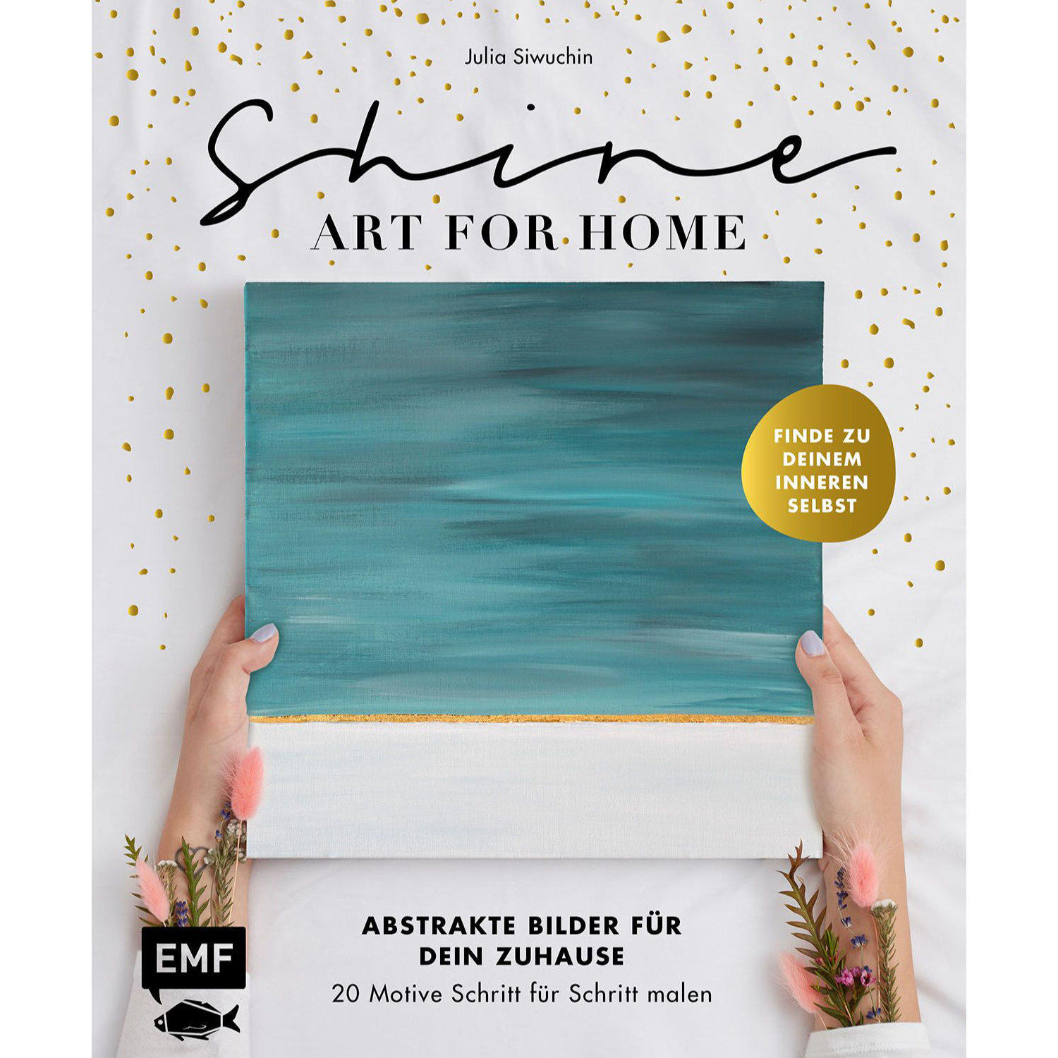 Shine – Art for Home: Buchcover mit abstraktem Gemälde in Blaugrün, gehalten von Händen. Marke EMF.