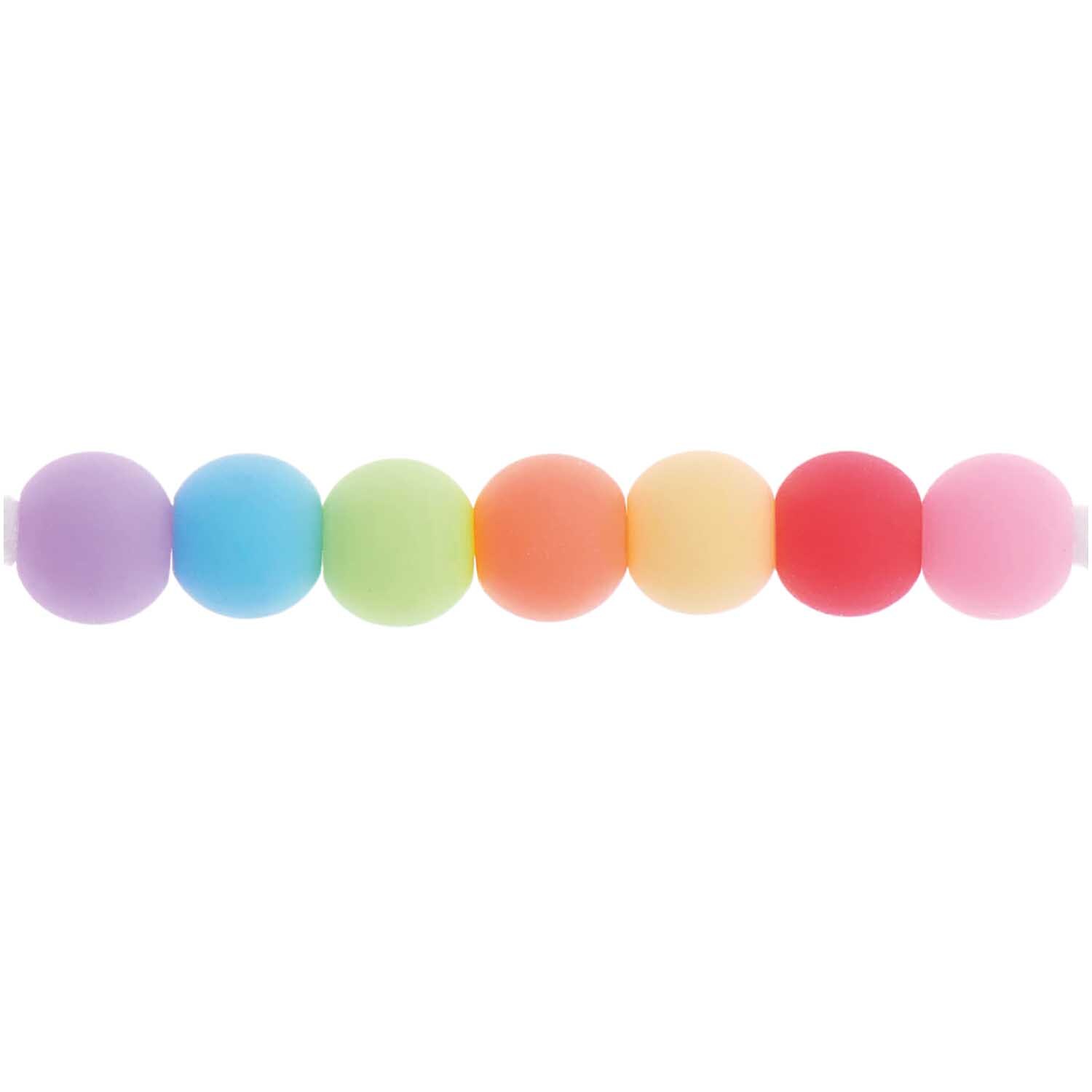 itoshii Kunststoffperlen in Regenbogenfarben, Ø6mm, 80 Stück. Pastellfarbene Perlen von Rico Design in einer Reihe angeordnet.