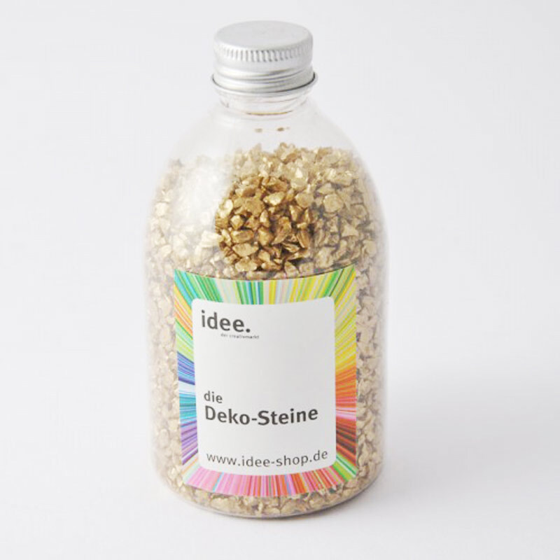 Dekosteine gold 360 g in einer transparenten Flasche von idee. Creativmarkt, ideal für kreative Dekorationen.