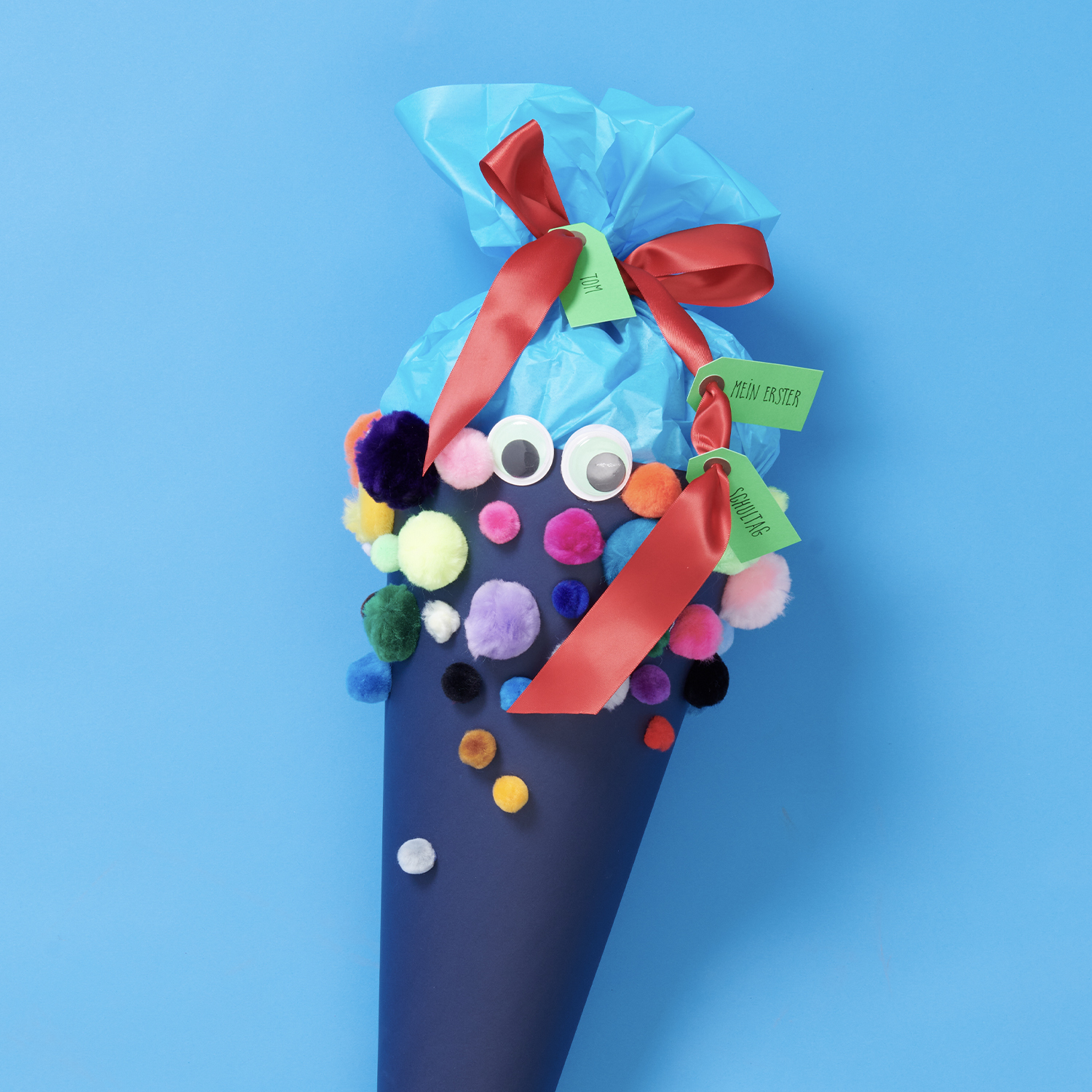 Bastelanleitung Schultüte mit Wackelaugen und Pompons von Rico Design