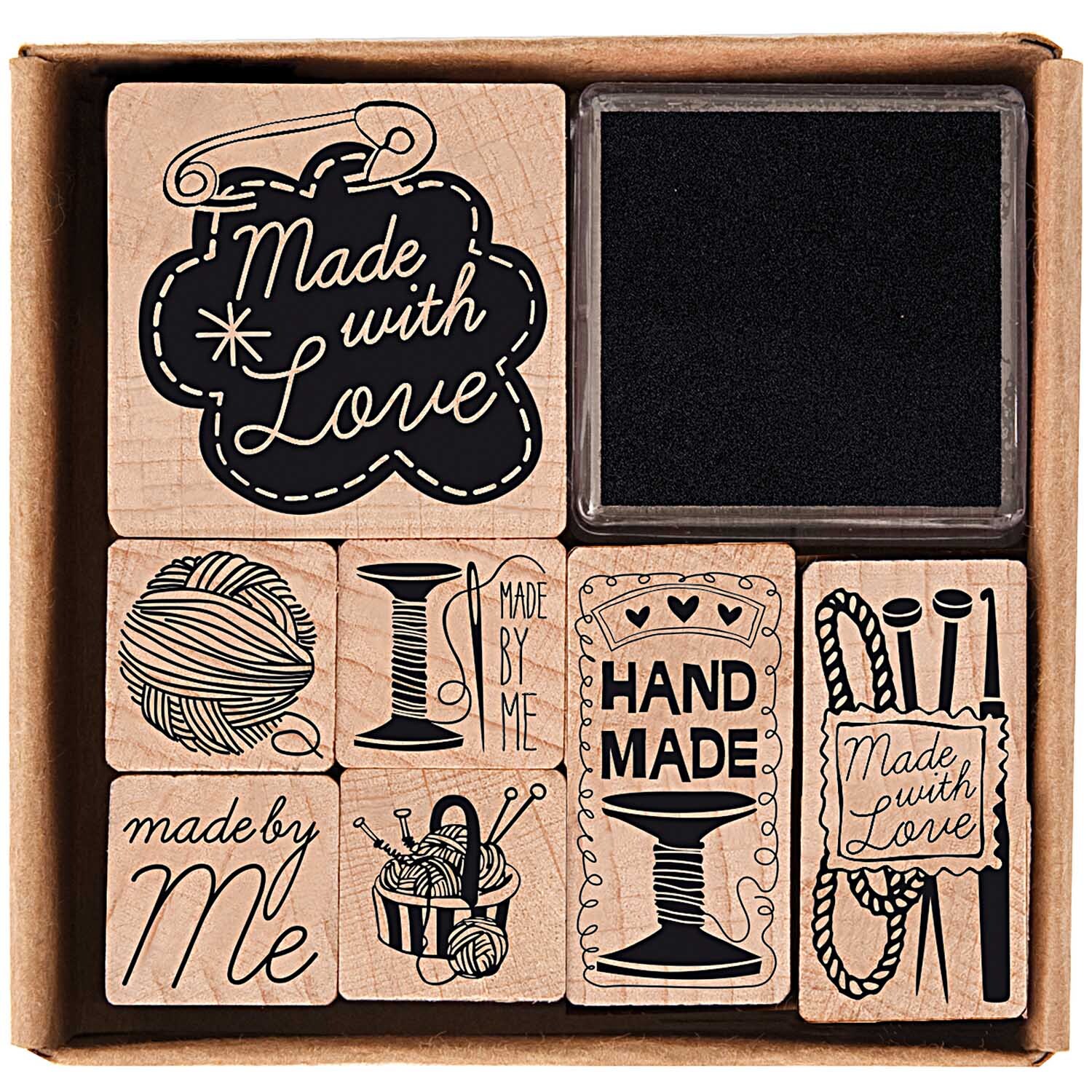 Paper Poetry Stempelset Handmade, 8-teilig, zeigt verschiedene schwarze Stempel mit Handarbeitsmotiven in einer Box. Ideal für kreative Projekte.