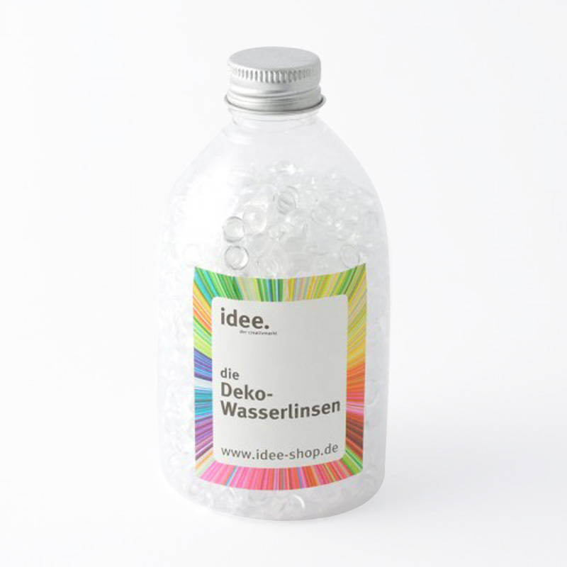 Wasserlinsen transparent 150g in einer klaren Flasche von idee. Creativmarkt, ideal für Dekorationen.