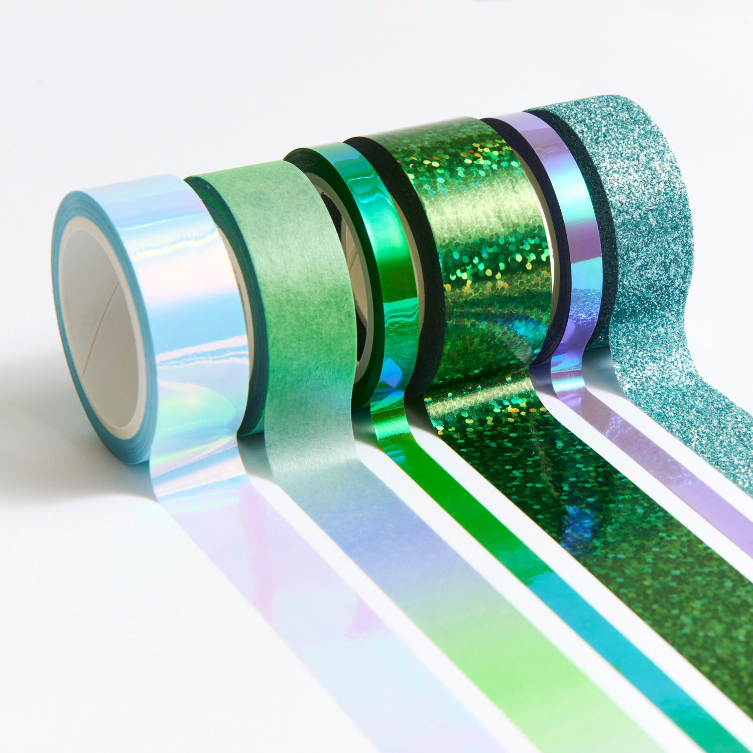 Paper Poetry Mixed Tape Set Grün/Blau, 6-teilig von Rico Design. Verschiedene grüne und blaue Washi-Tapes in schimmernden und glitzernden Designs.