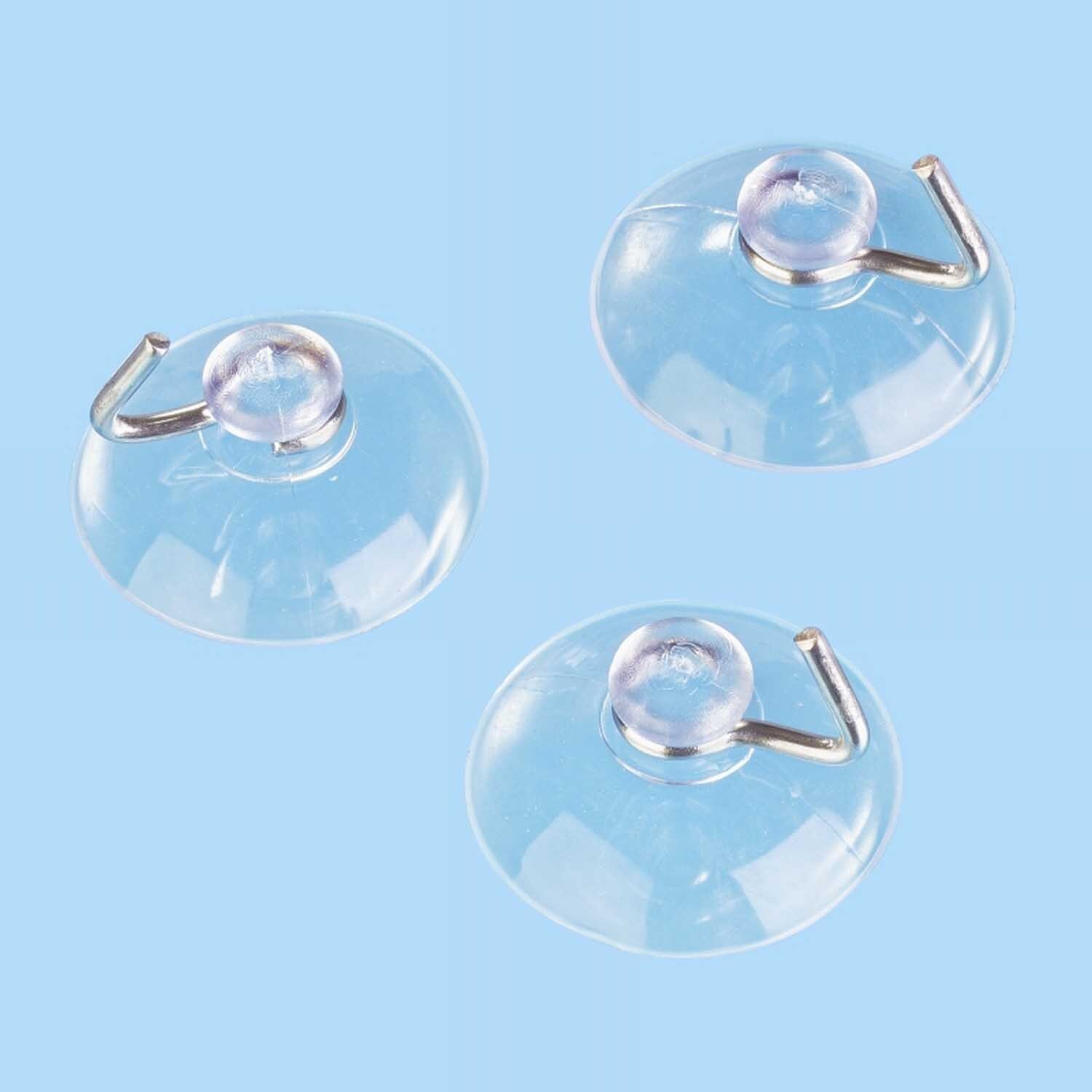 Deko Sauger mit Haken 22mm von HobbyFun: Drei transparente Saugnäpfe mit Haken auf blauem Hintergrund.