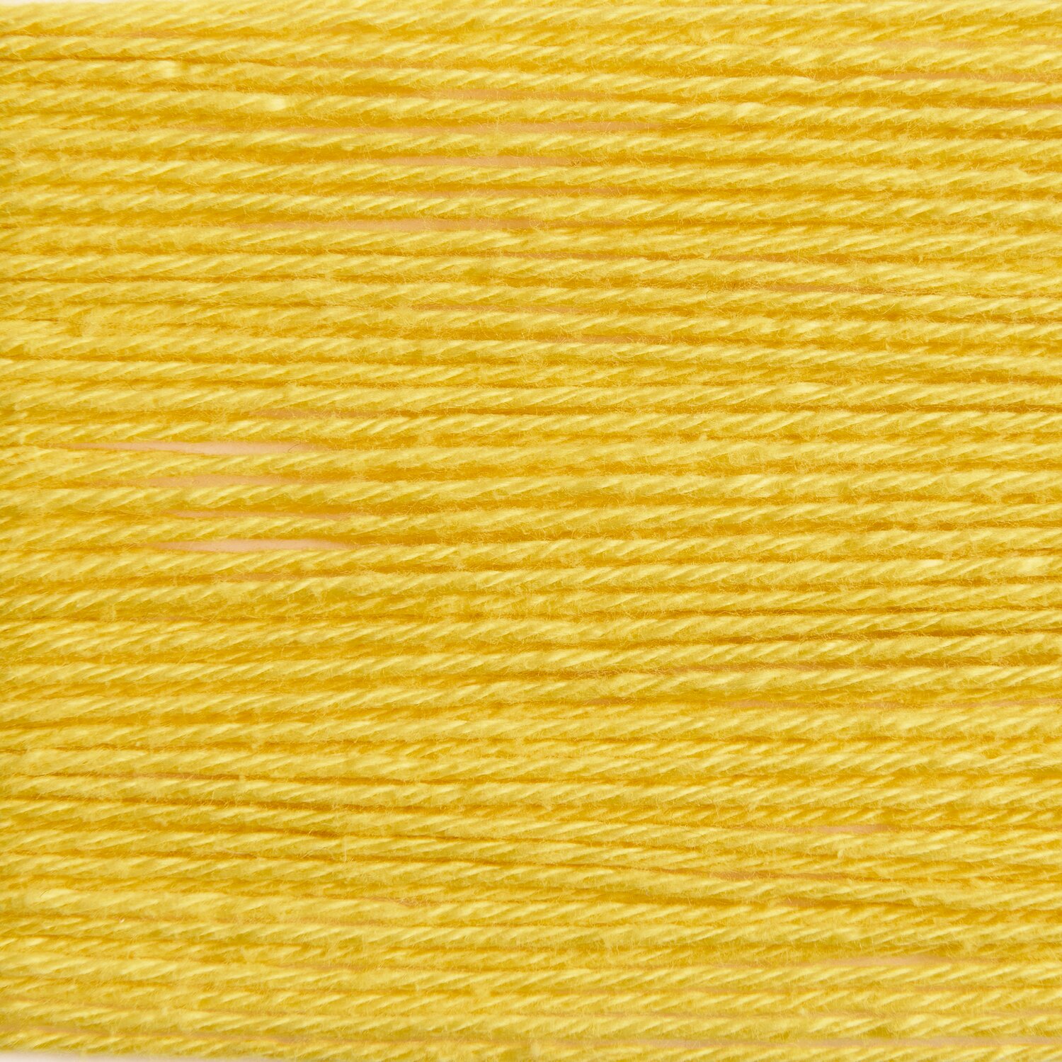 Rico Cotton, 50g 125m: Strahlend gelbes Garn von Rico Design, ideal für kreative Strickprojekte.