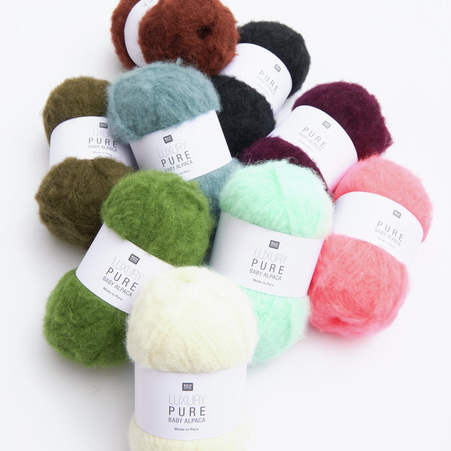 Luxury Pure Baby Alpaca Wolle in verschiedenen Farben wie Creme, Koralle und Mint, 50g 150m.