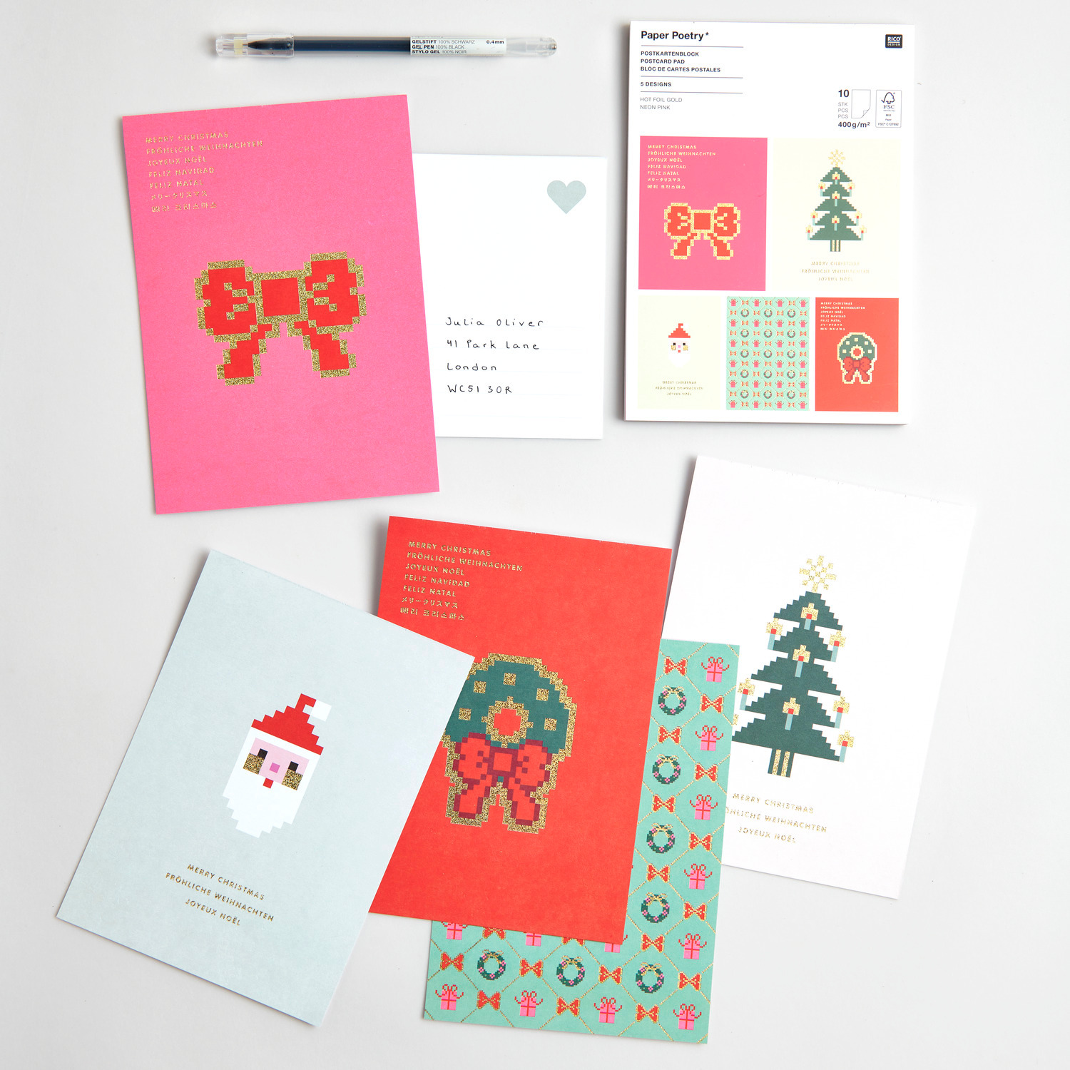 Paper Poetry Postkartenblock Schleifen Pixel: Bunte Karten mit weihnachtlichen Motiven, ideal für kreative Grüße. Größe: 12,5x17,6cm.