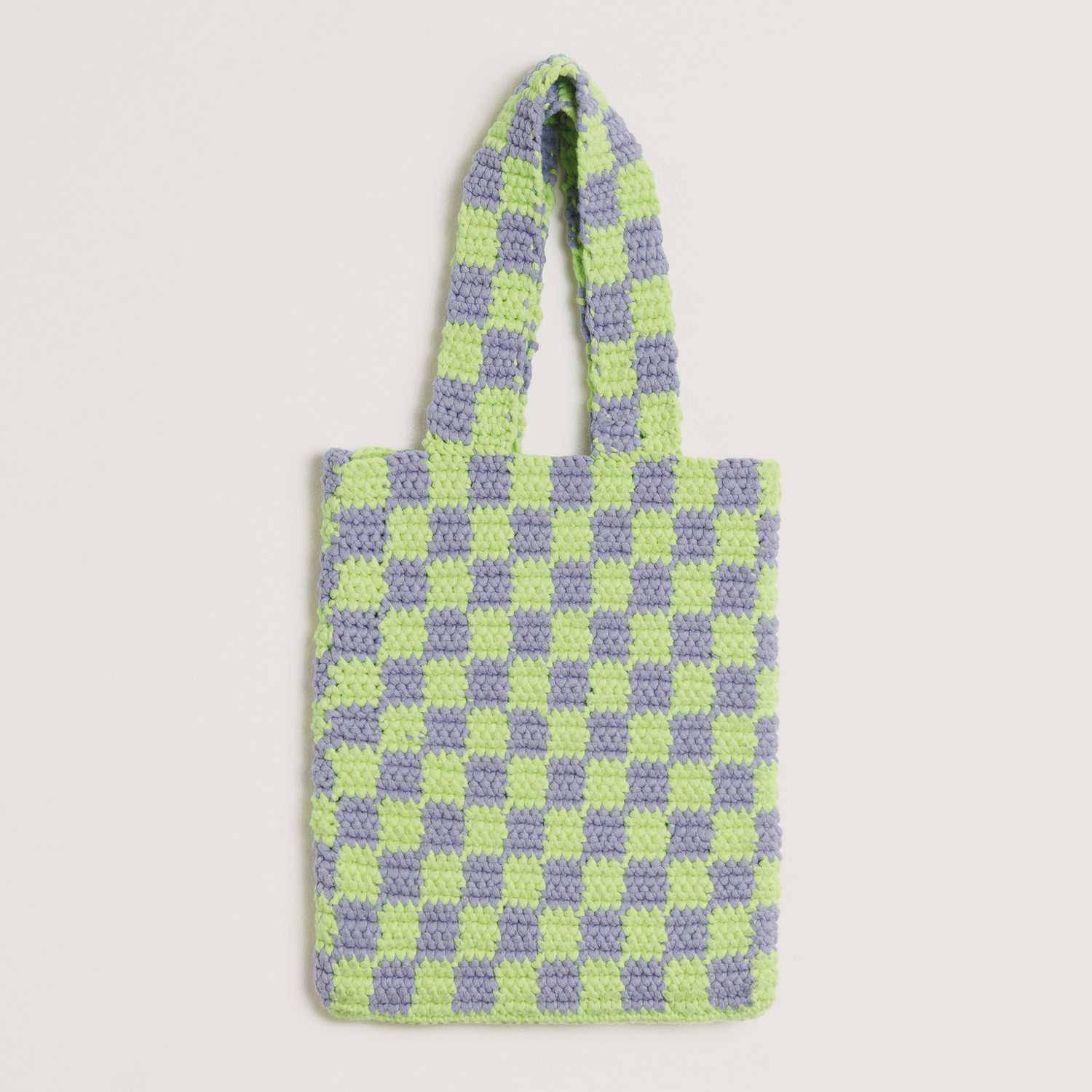 Häkelset Tasche Modell 40: Eine stilvolle Tasche in Lavendel und Hellgrün von Rico Design, ideal für den Alltag.