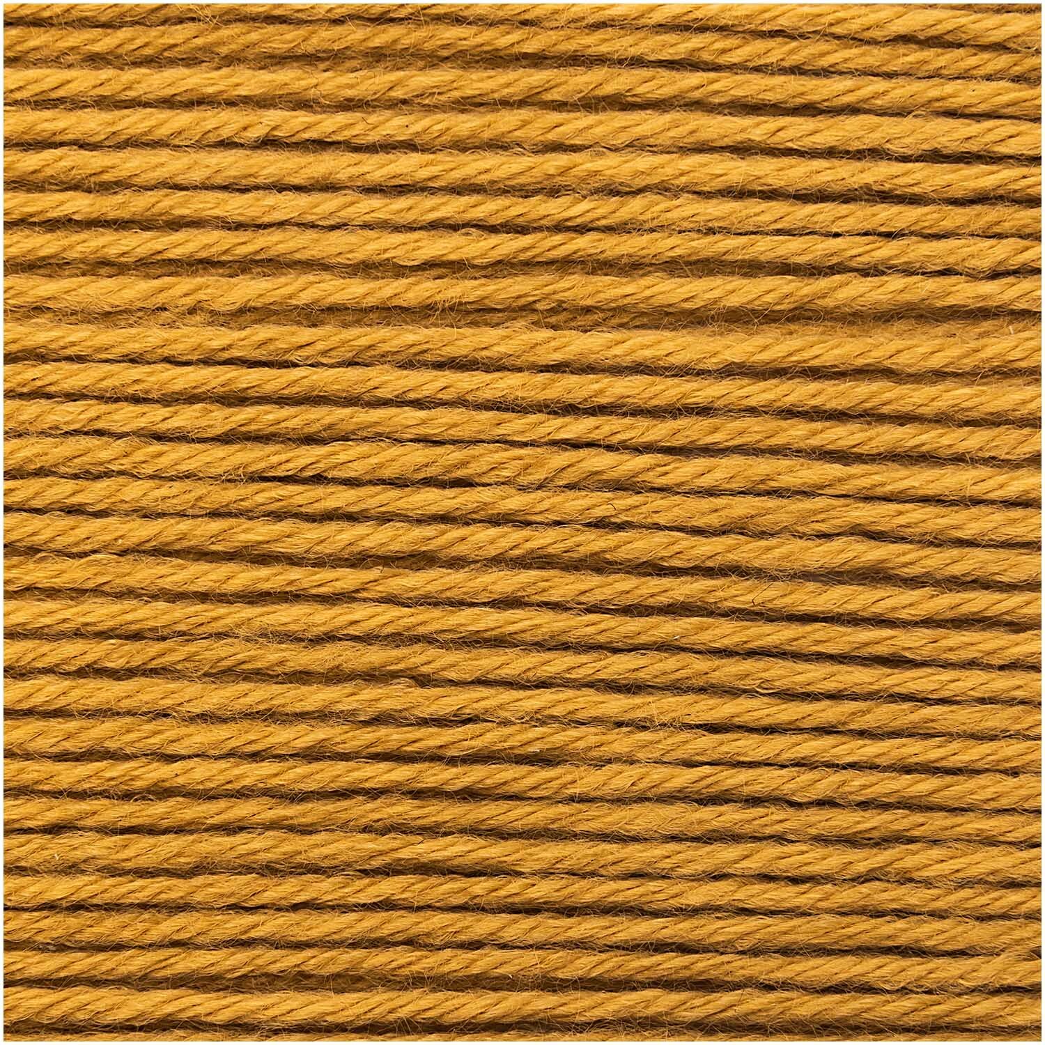 Rico Baby Dream dk uni - A Luxury Touch: Senffarbene Wolle von Rico Design, 50g Knäuel, 115m Länge, ideal für weiche Strickprojekte.
