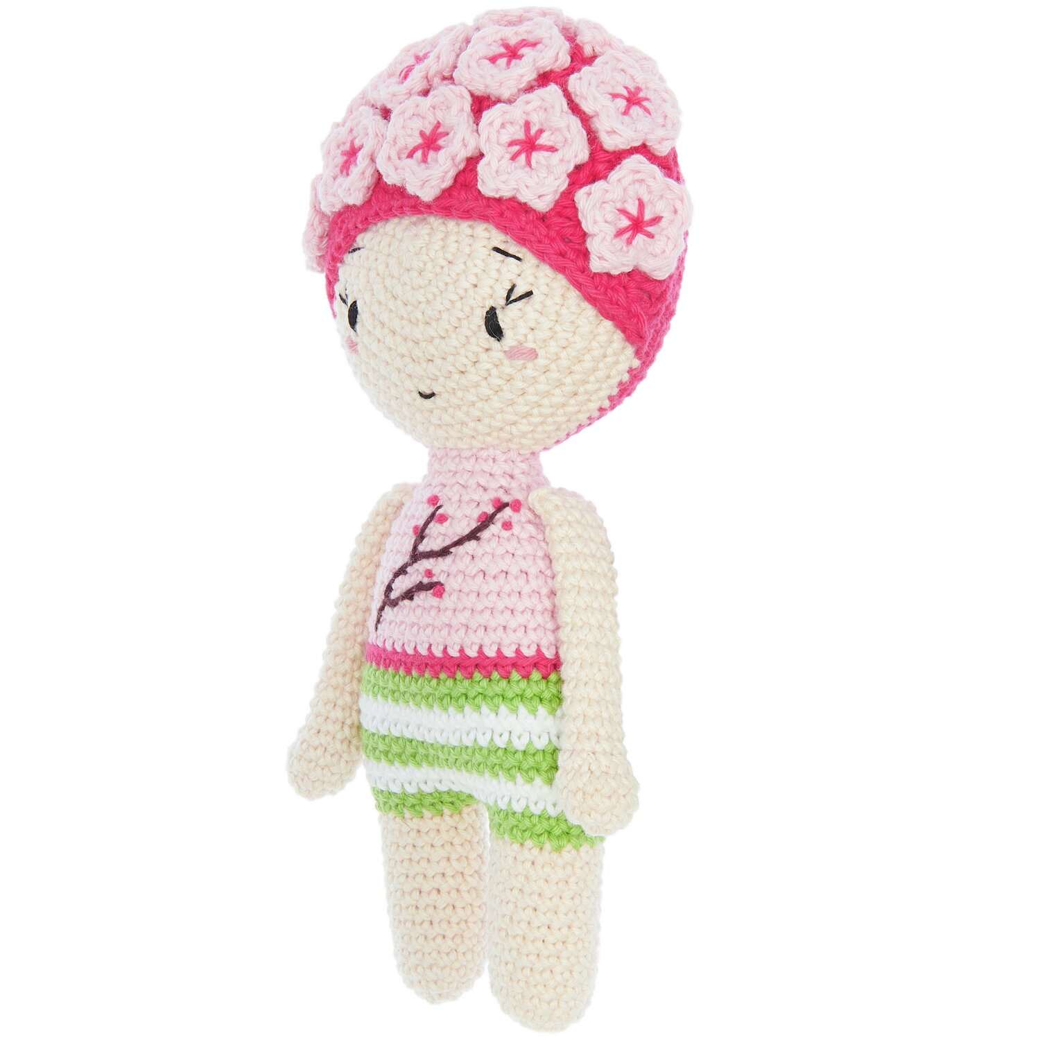 Creative Ricorumi dk: Gehäkelte Puppe mit Blumenmütze, gestreiftem Outfit in Rosa und Grün.