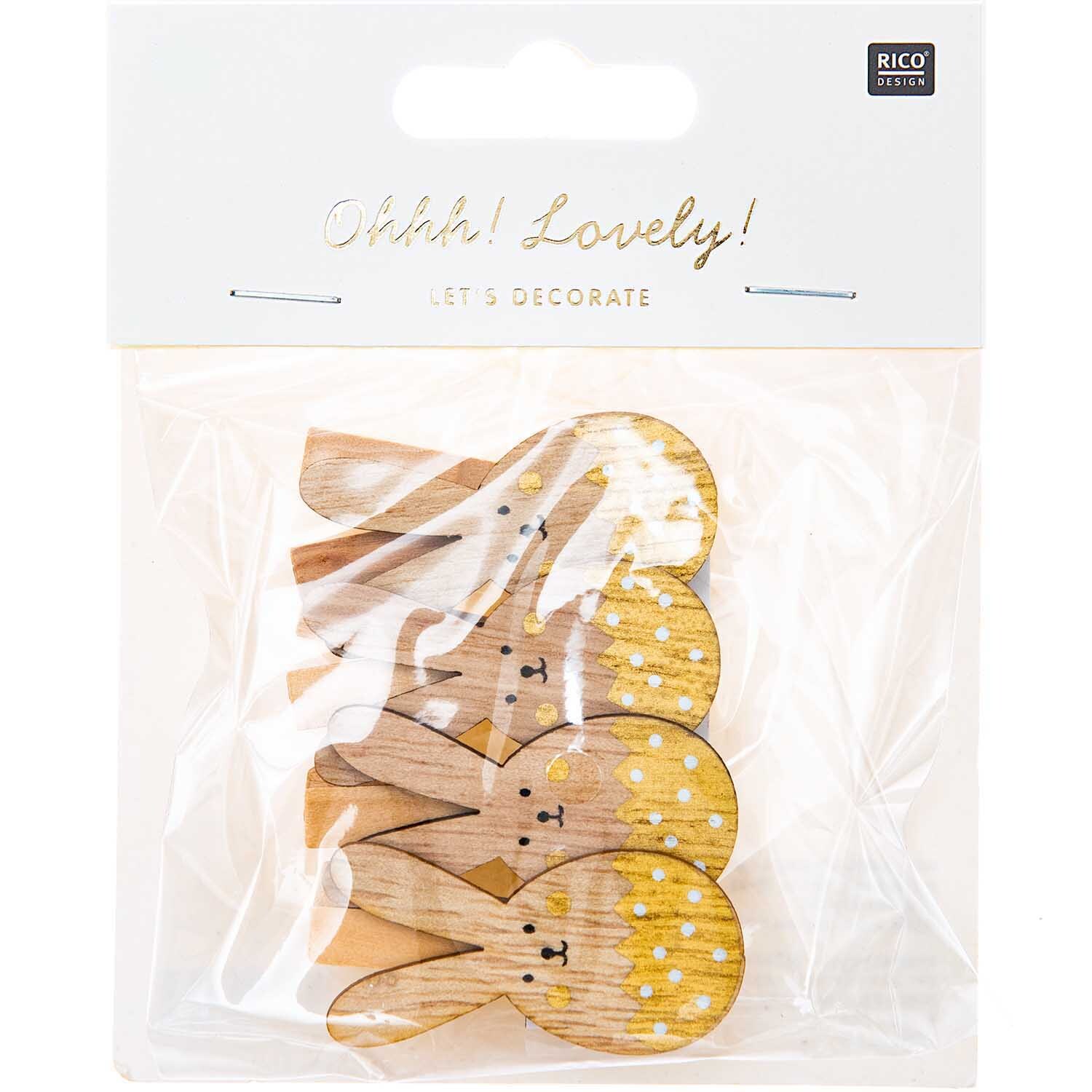 Dekoklammern Osterhase 4 Stück von Rico Design in Gold, verpackt in einer transparenten Tüte.
