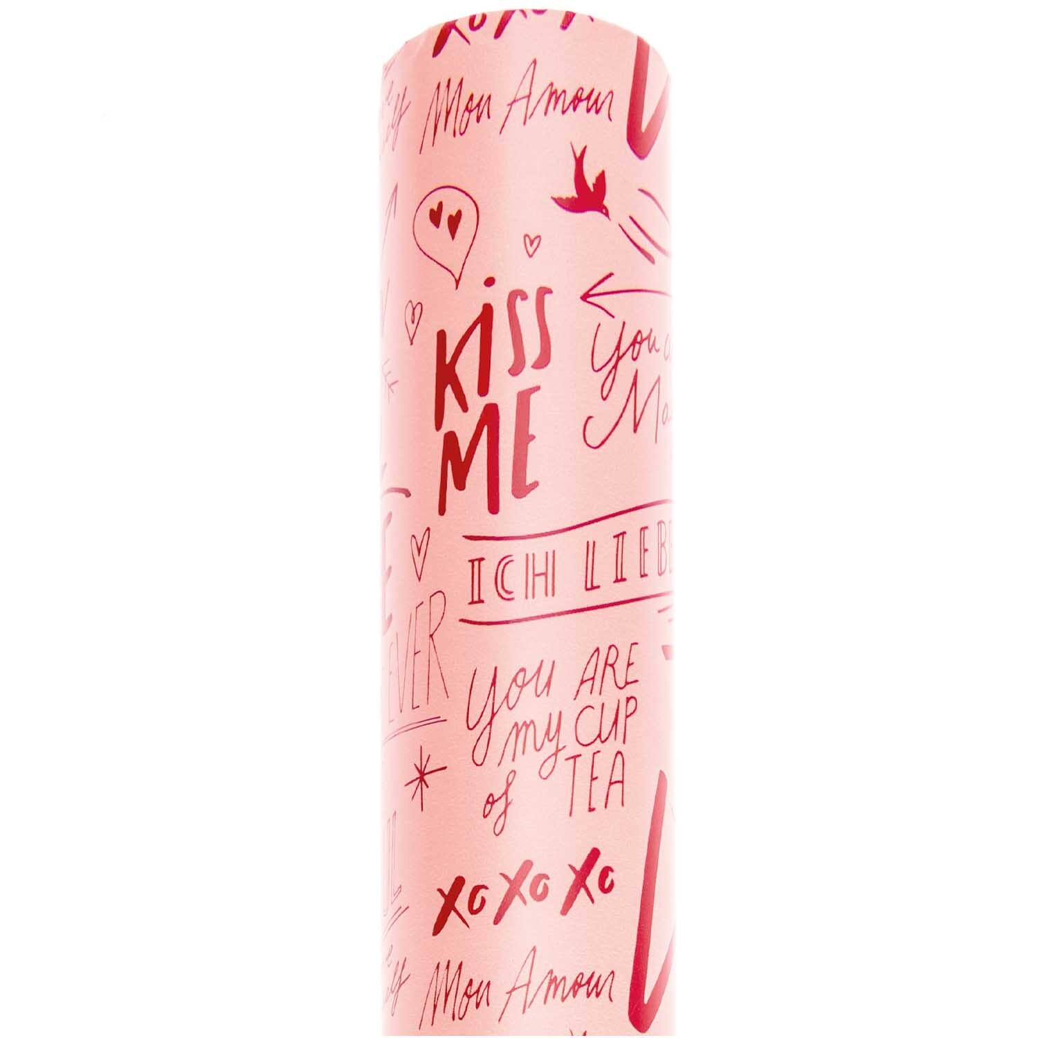 Paper Poetry Geschenkpapier mit romantischen Motiven in Rosa, ideal für besondere Anlässe.