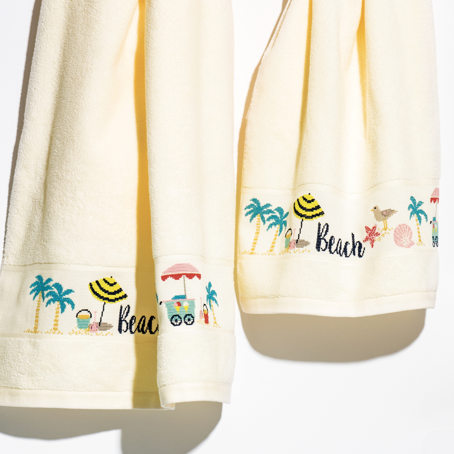 Stickanleitung Frottierhandtuch mit Strand-Motiven besticken von Rico Design
