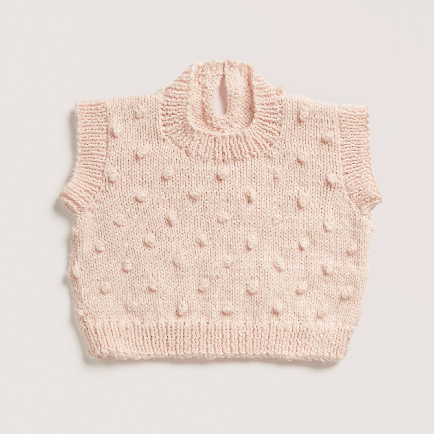 Strickset Top Modell 01 aus Baby 042 in zartem Lachs von Rico Design. Weiches, strukturiertes Strickmuster für Babys.