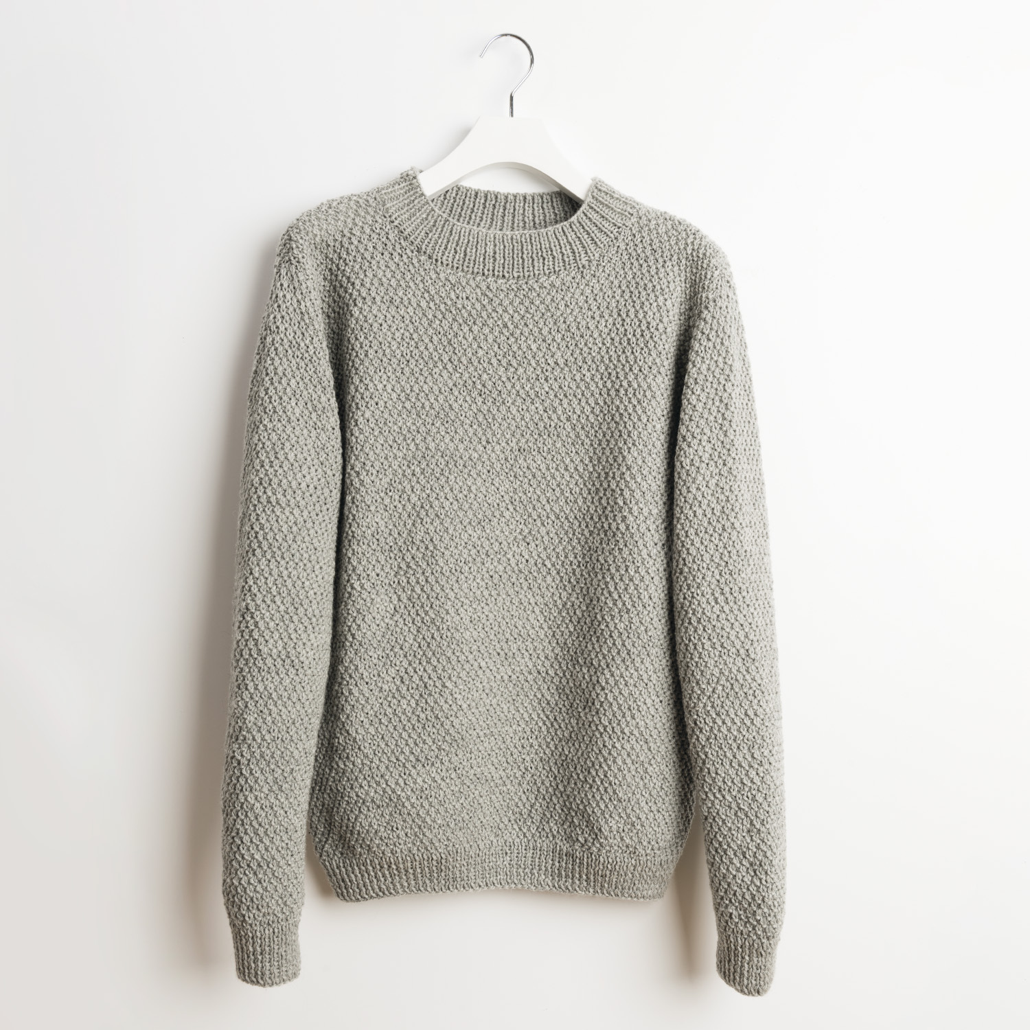 Strickanleitung Herrenpullover im Perlmuster aus Essentials Soft Merino aran von Rico Design