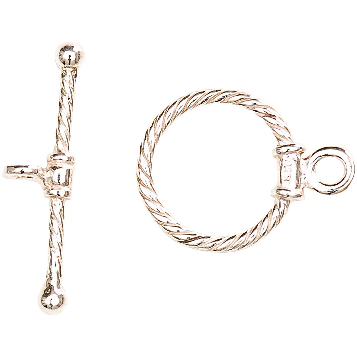 Knebelverschluss 25x20mm 925er Silber von Rico Design, bestehend aus einem runden Ring und einem Stab mit gedrehtem Muster.