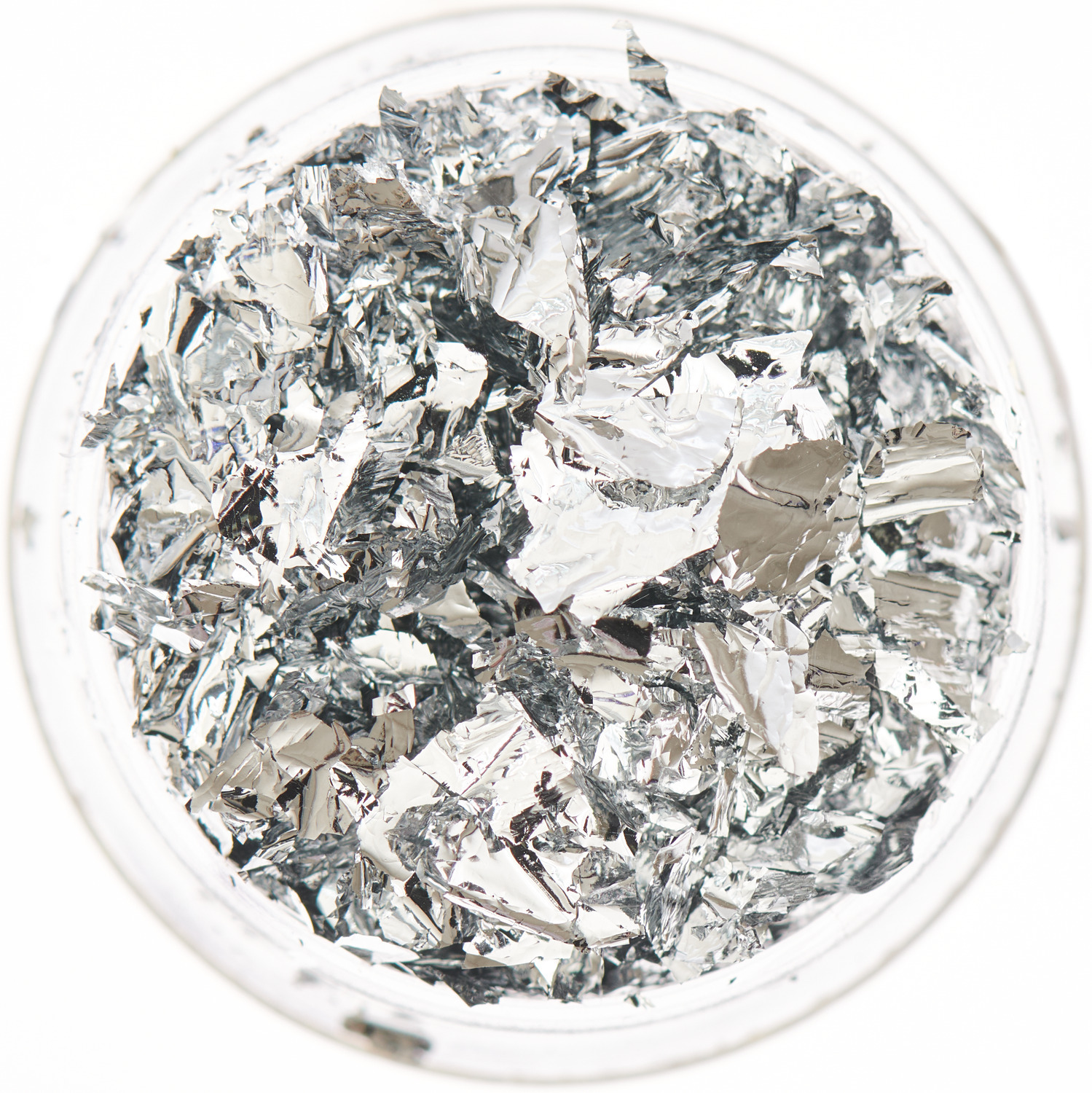 Blattmetall für Resin in Silber von Rico Design, 5ml. Detailaufnahme von glänzendem, silbernem Blattmetall in einem runden Behälter.