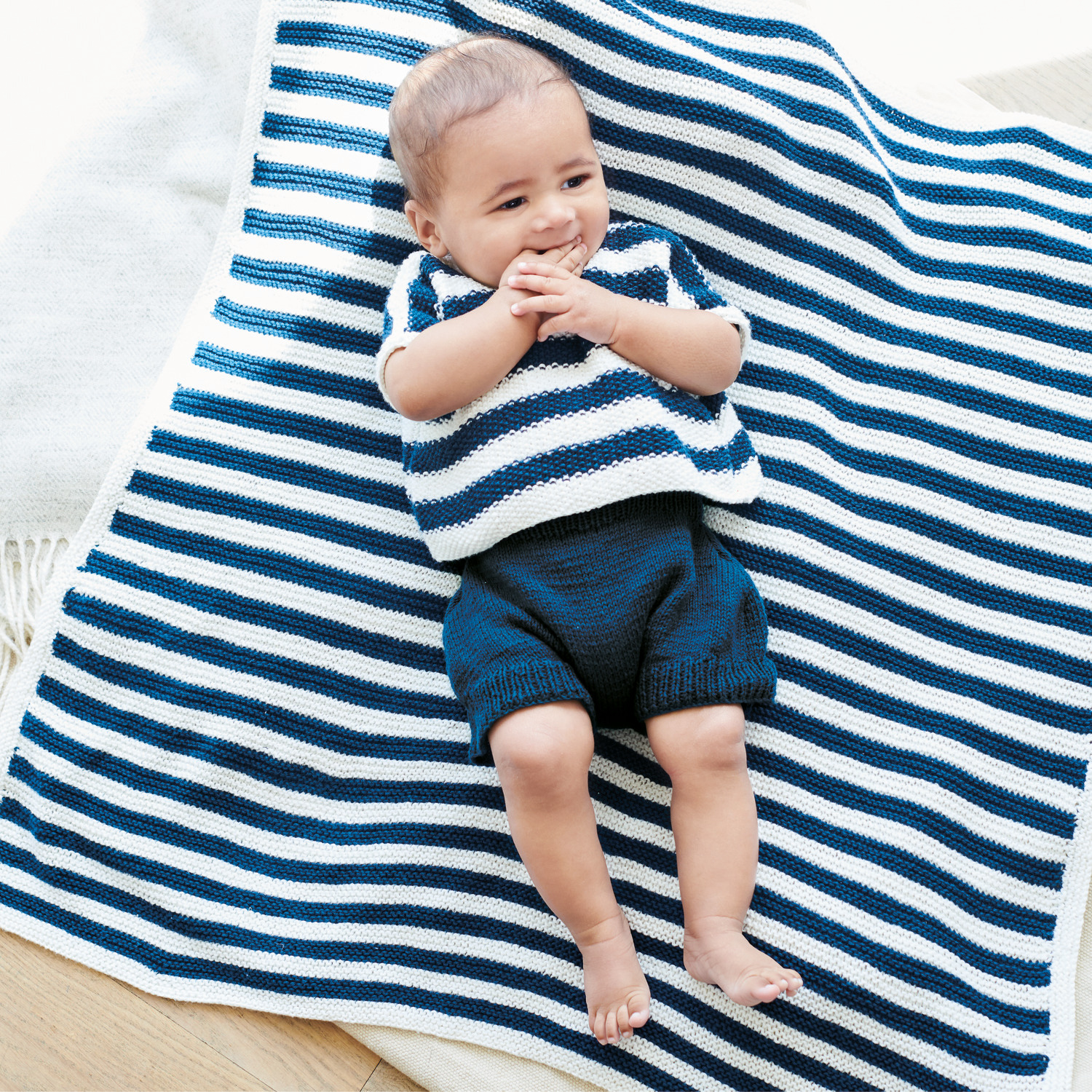 Strickset Decke Modell 09 aus Baby Nr. 39 von Rico Design