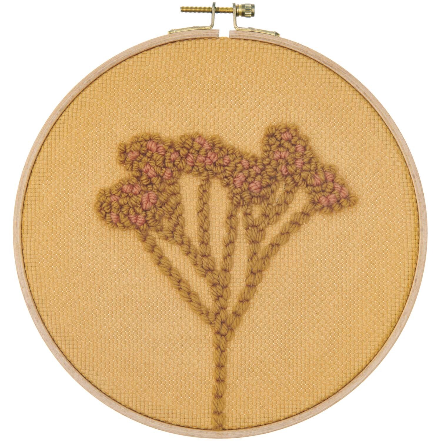 Punch Needle Packung Bild Schleierkraut zeigt ein florales Design auf gelbem Stoff, hergestellt von Rico Design.