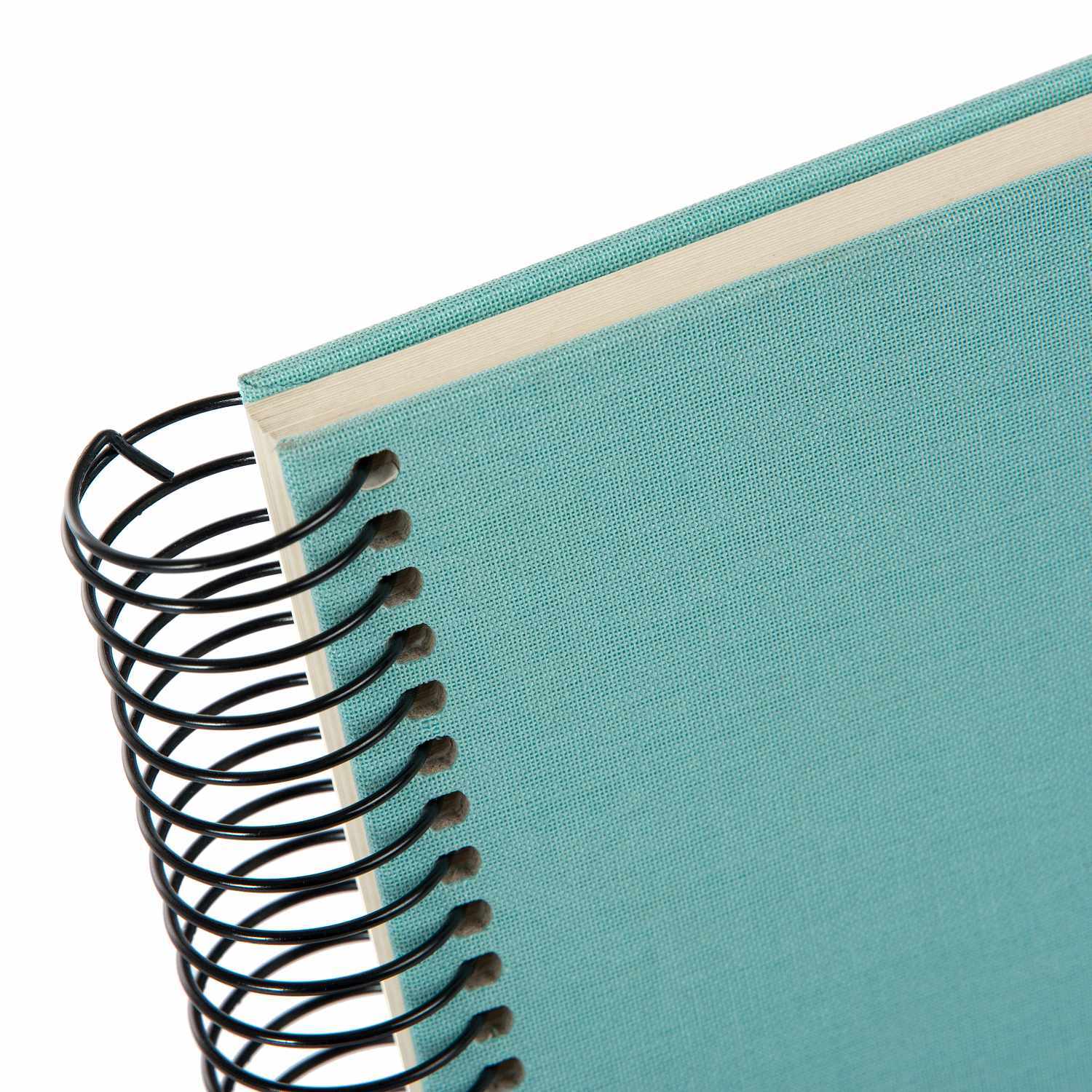 Spiralalbum 24x17cm Leinen 40 weiße Seiten in Aqua mit stabiler Spiralbindung von goldbuch. Ideal für kreative Erinnerungen.