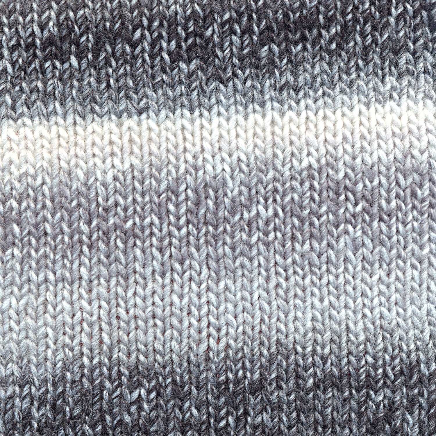 Creative Melange chunky von Rico Design: Nahaufnahme eines gestrickten Stoffes in Grautönen, 50g 85m. Ideal für warme, stilvolle Strickprojekte.