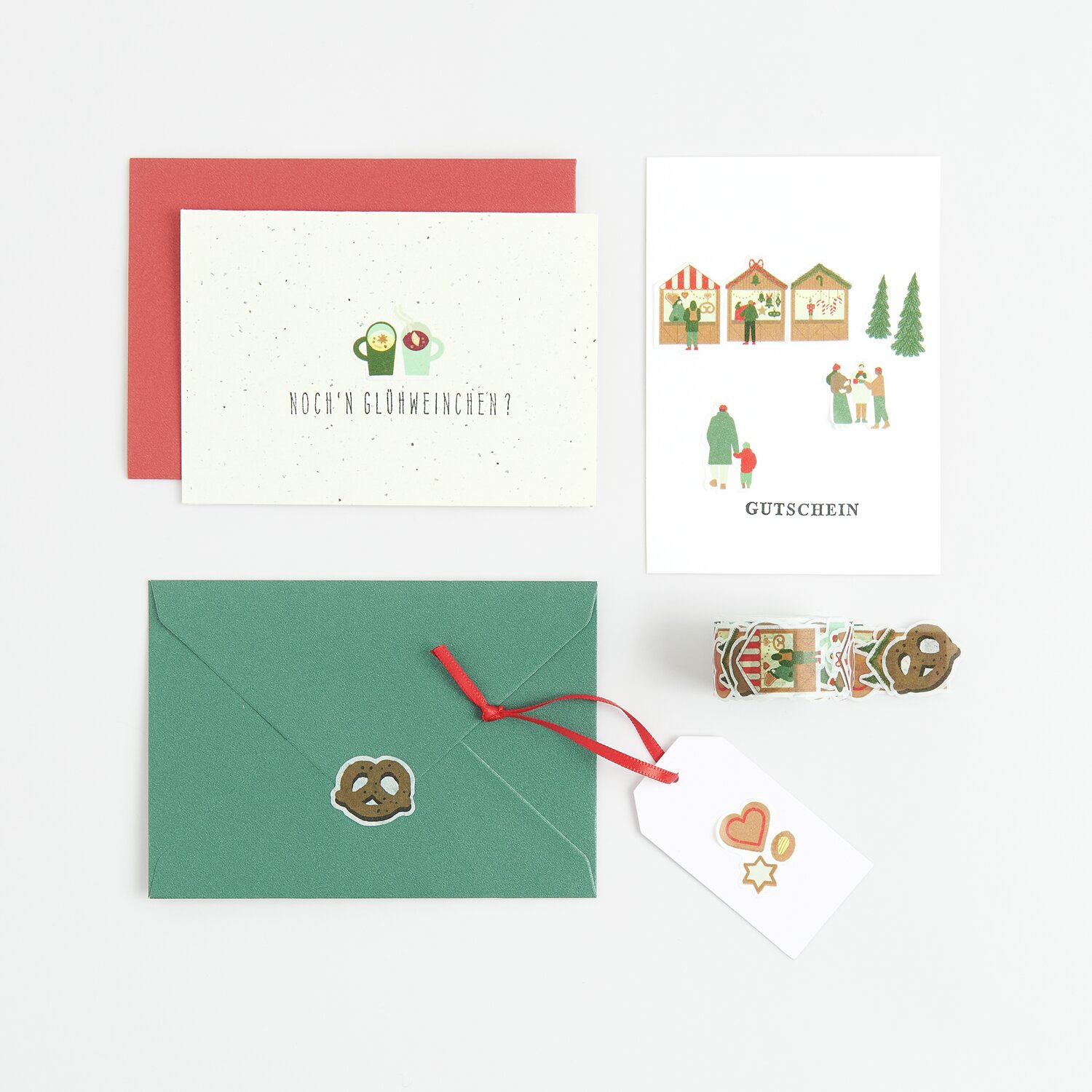 Washi Sticker Weihnachtsmarkt 200 Stück: Bunte Karten und Umschläge mit festlichen Motiven.