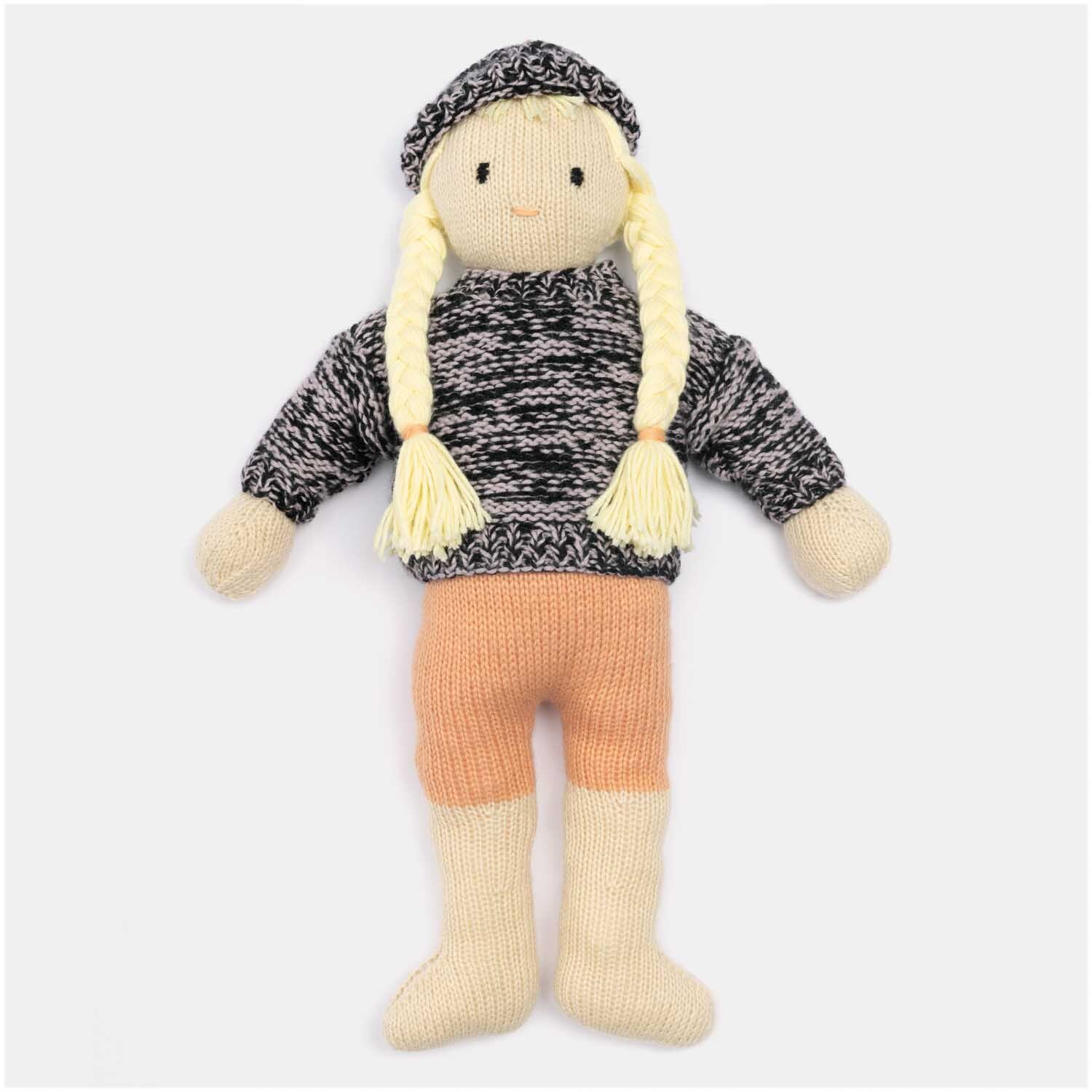 Rico Baby Dream dk uni - A Luxury Touch: Handgestrickte Puppe mit cremefarbenen Zöpfen und gemustertem Pullover.