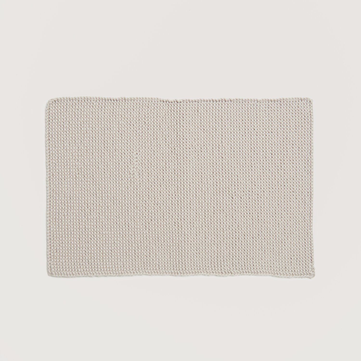 Home Special Fashion Jersey: Rechteckiges, gestricktes Stück in neutralem Ton, ideal für DIY-Projekte.